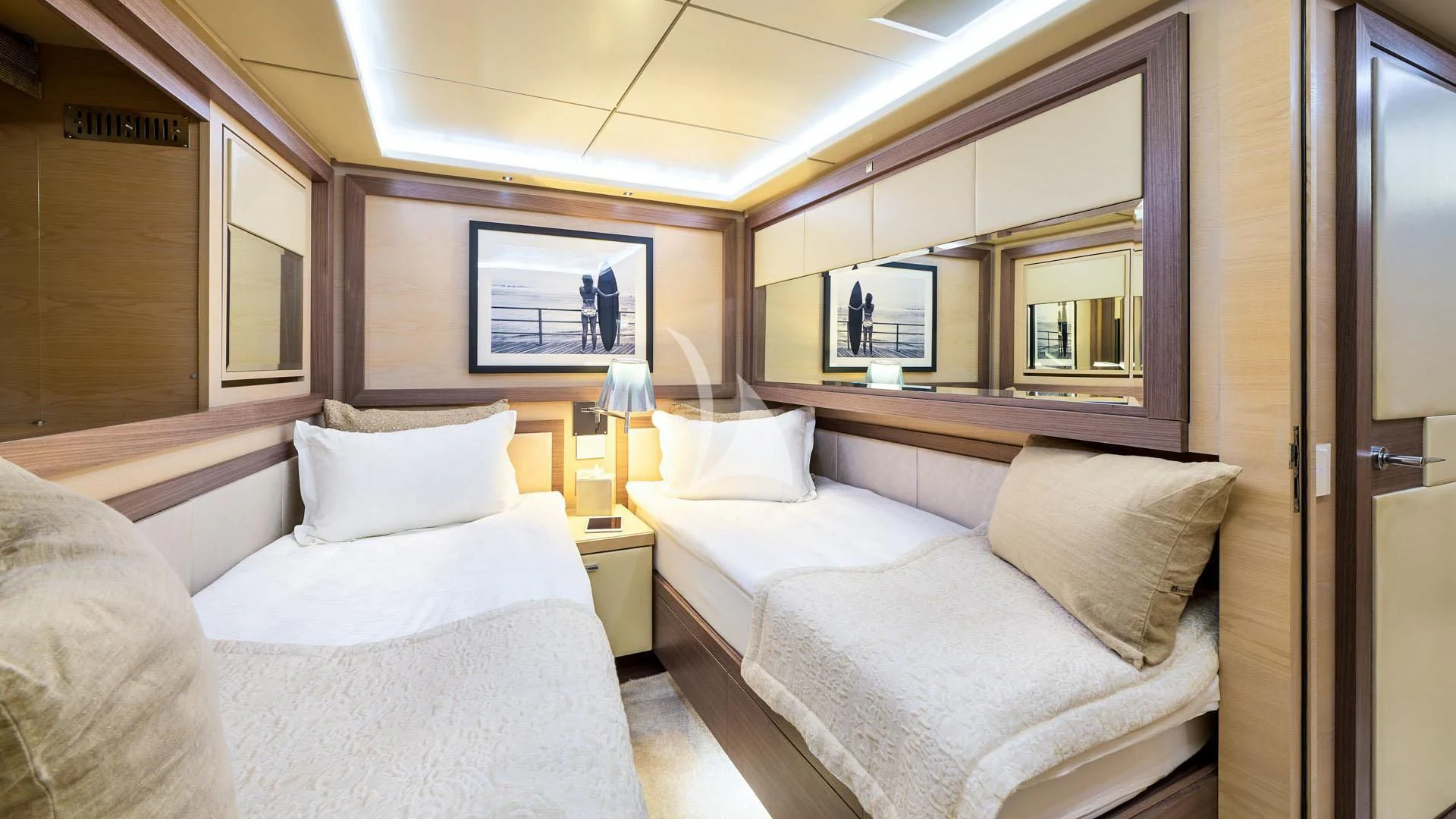 a room with two beds aboard OCEAN DRIVE Yacht for Charter
