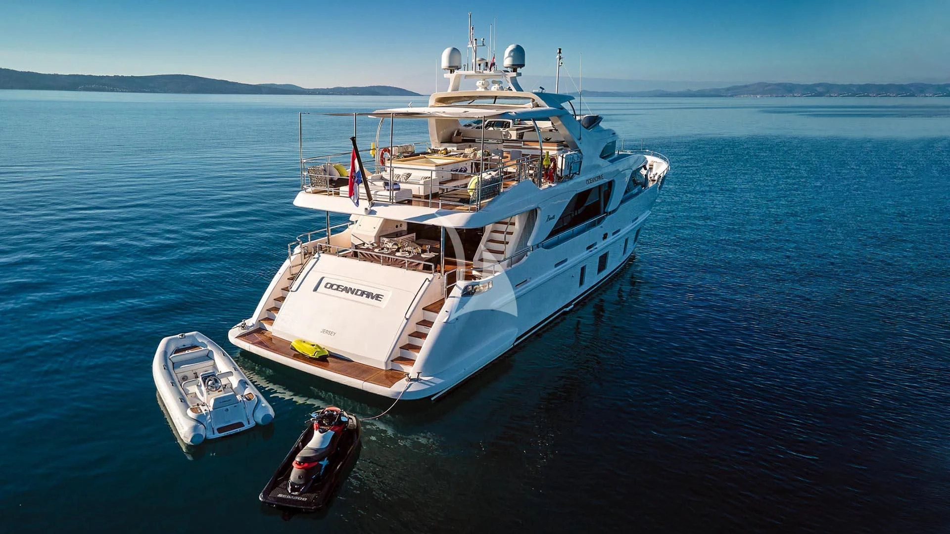 a boat and a boat in the water aboard OCEAN DRIVE Yacht for Charter