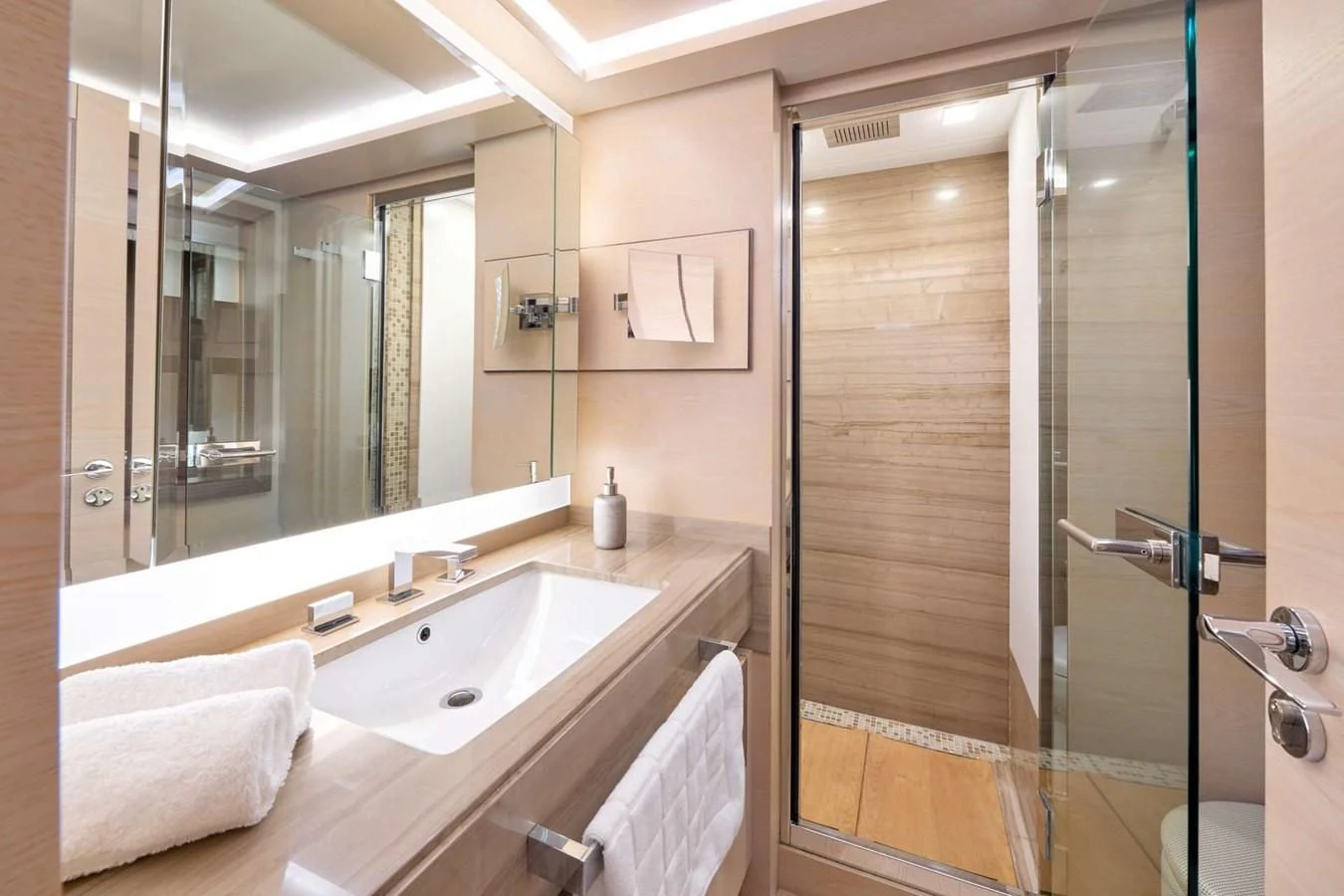 a bathroom with a sink and a shower aboard OCEAN DRIVE Yacht for Charter