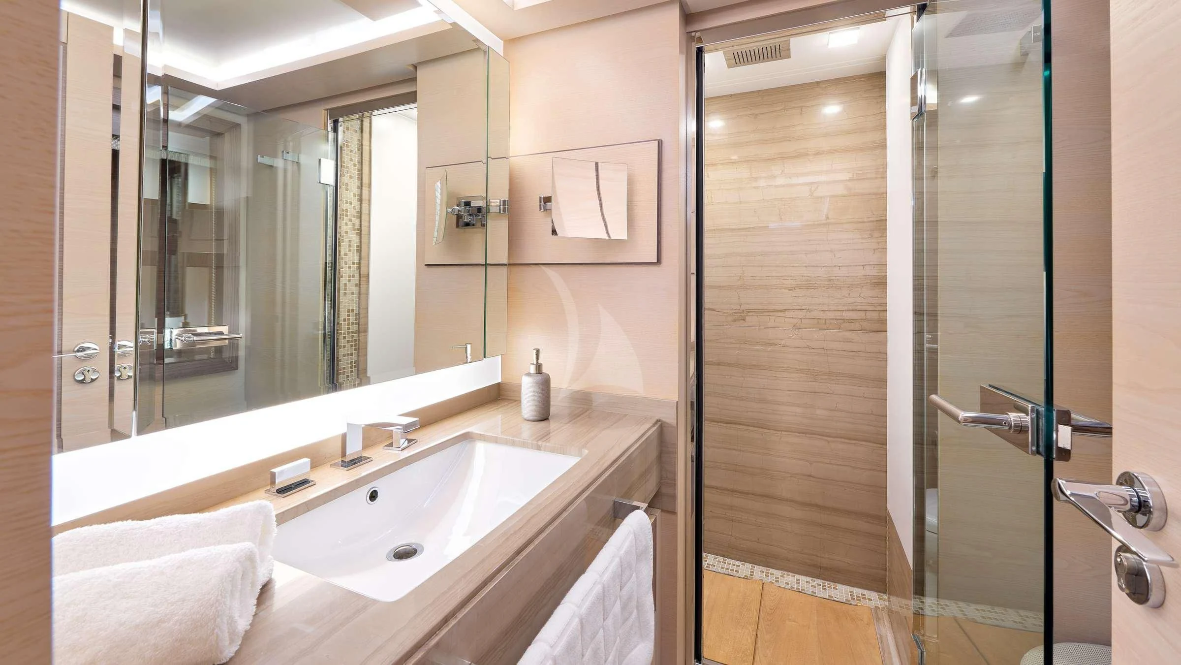 a bathroom with a sink and shower aboard OCEAN DRIVE Yacht for Charter