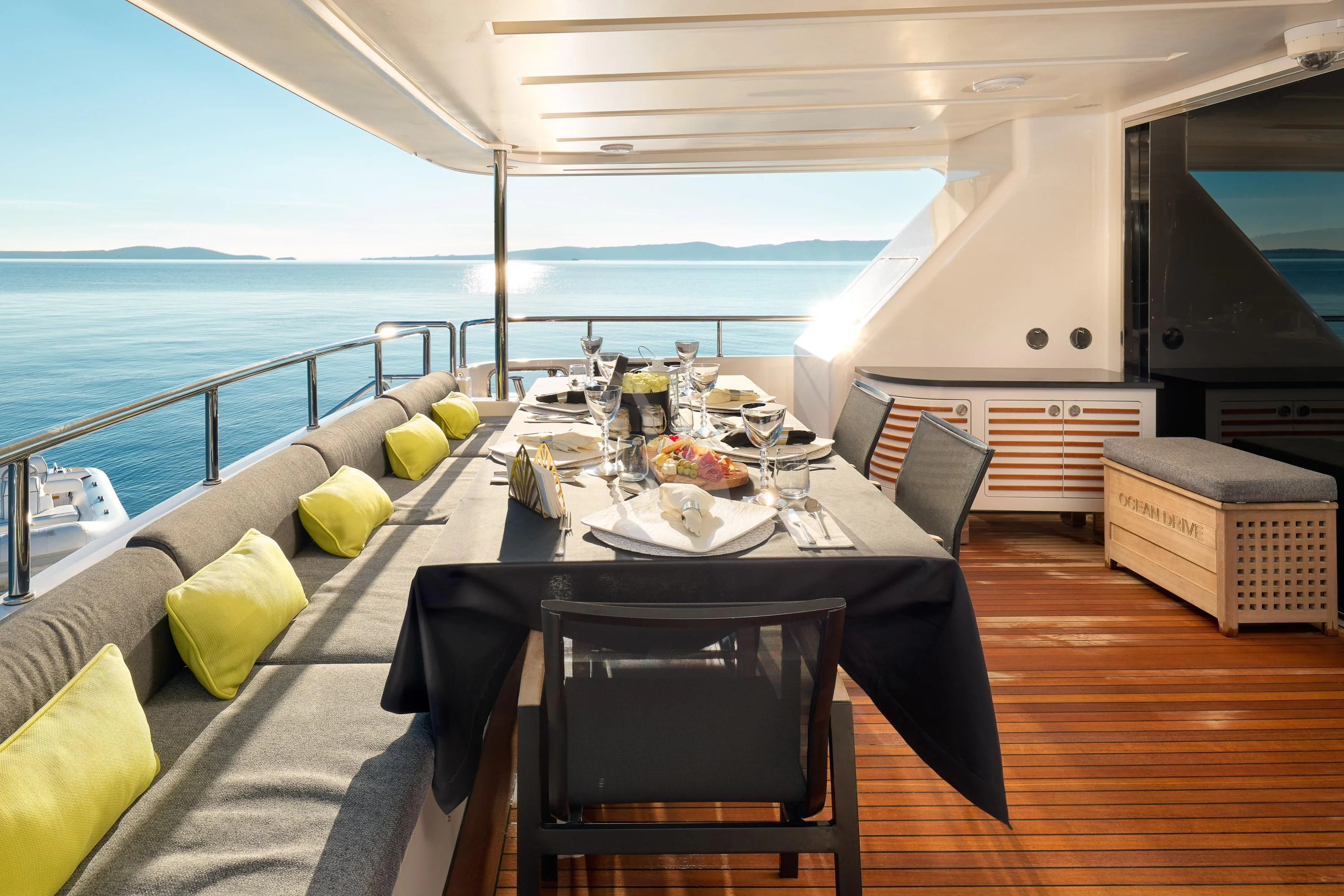a table on a deck aboard OCEAN DRIVE Yacht for Charter