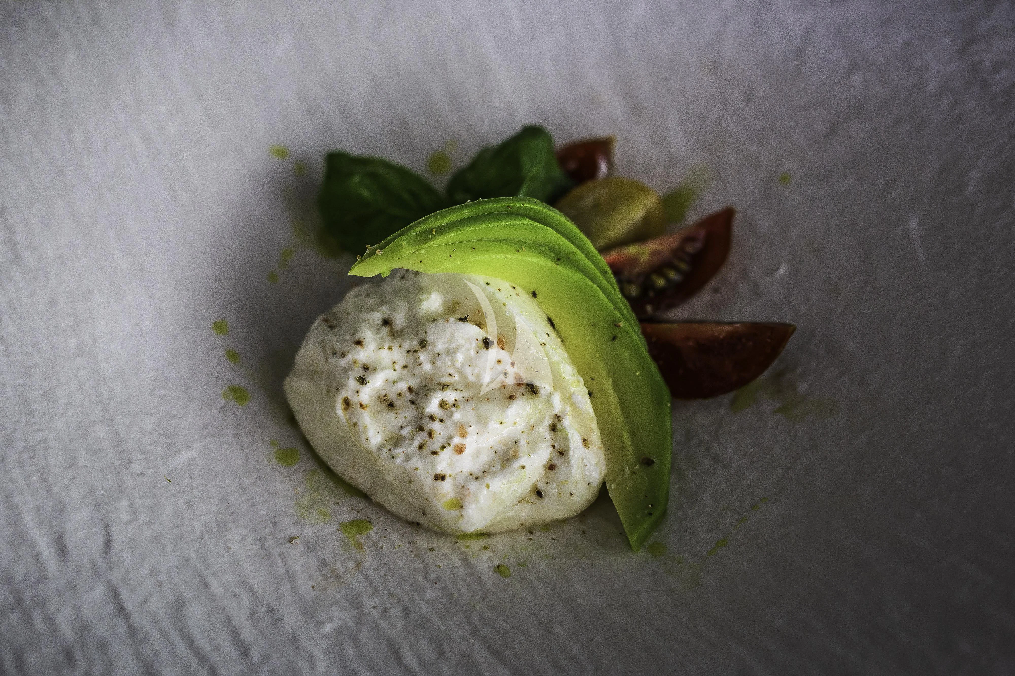 a piece of food on a table aboard OCEAN DRIVE Yacht for Charter