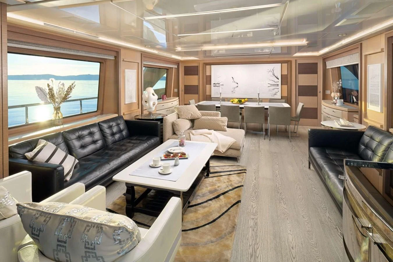 a living room with a large window aboard OCEAN DRIVE Yacht for Charter