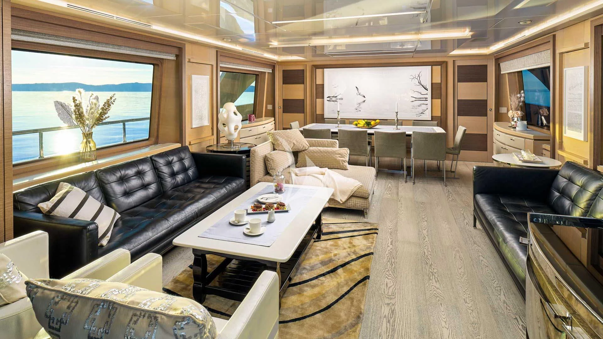 a living room with a large screen aboard OCEAN DRIVE Yacht for Charter
