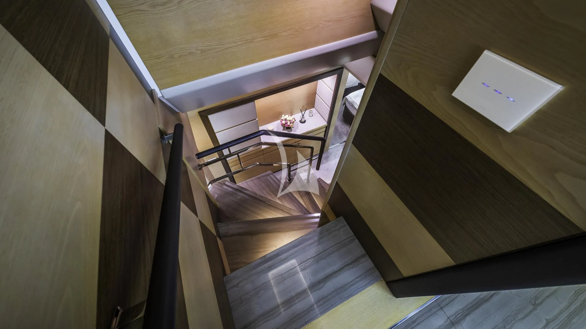 a laptop on a wooden table aboard OCEAN DRIVE Yacht for Charter