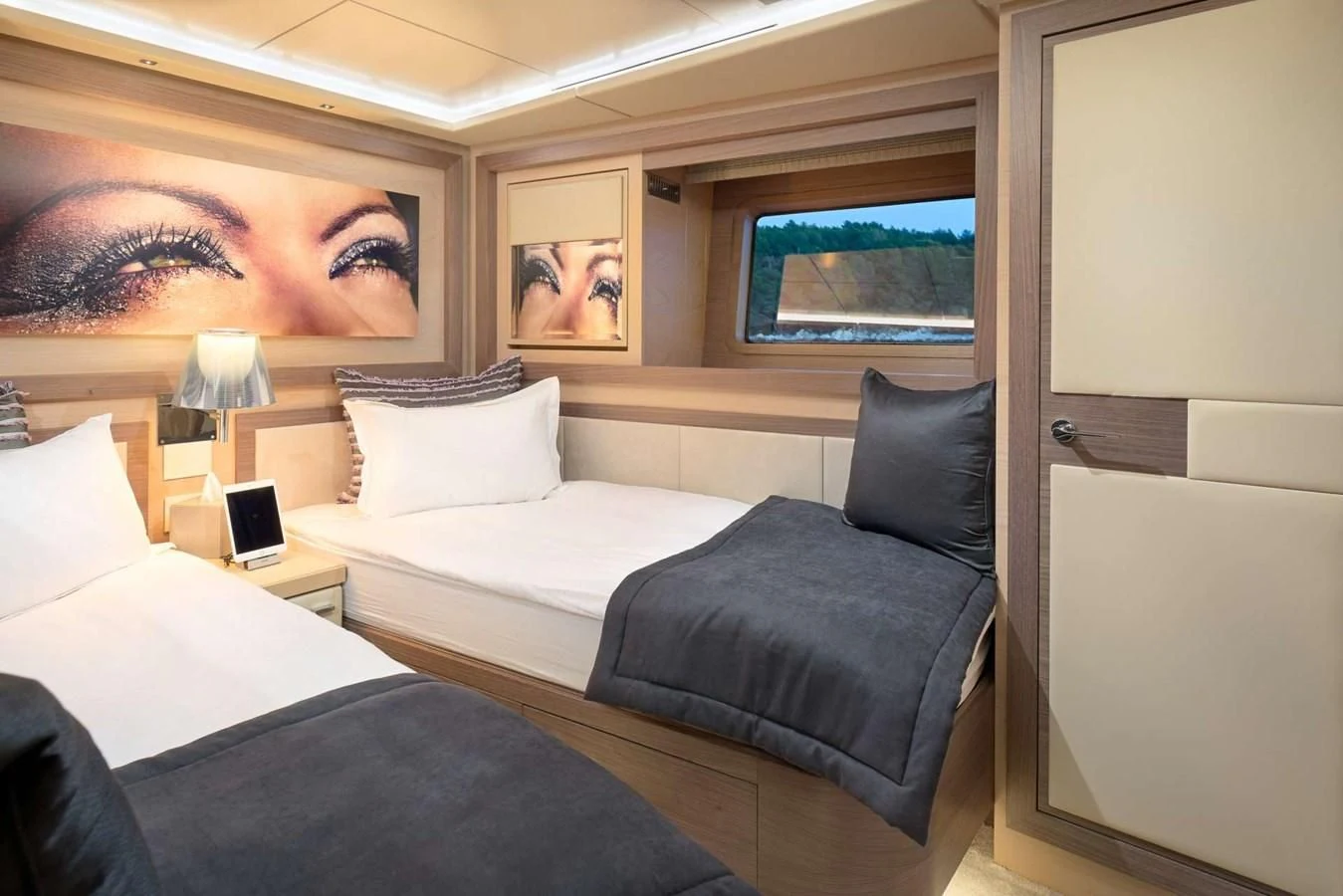 a couple of beds in a room aboard OCEAN DRIVE Yacht for Charter