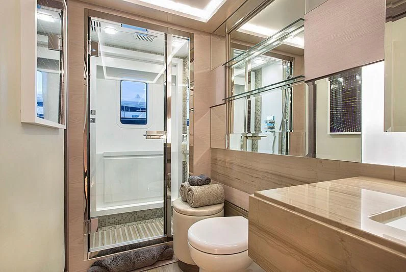 a bathroom with a glass shower aboard OCEAN DRIVE Yacht for Charter