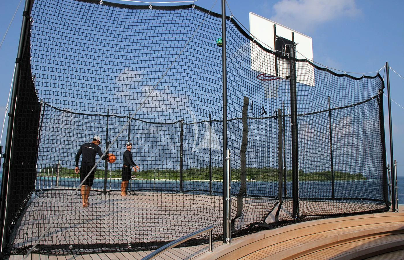 a couple of men play basketball aboard SAVANNAH Yacht for Sale