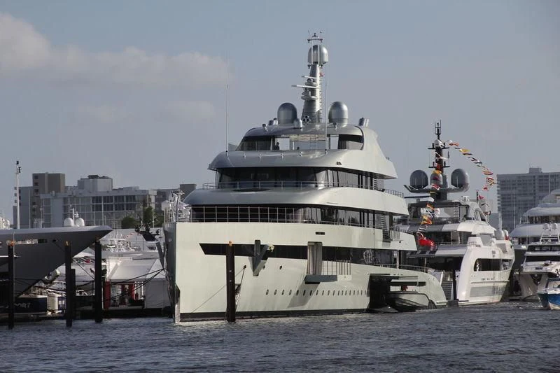 a large ship docked at a port aboard SAVANNAH Yacht for Sale