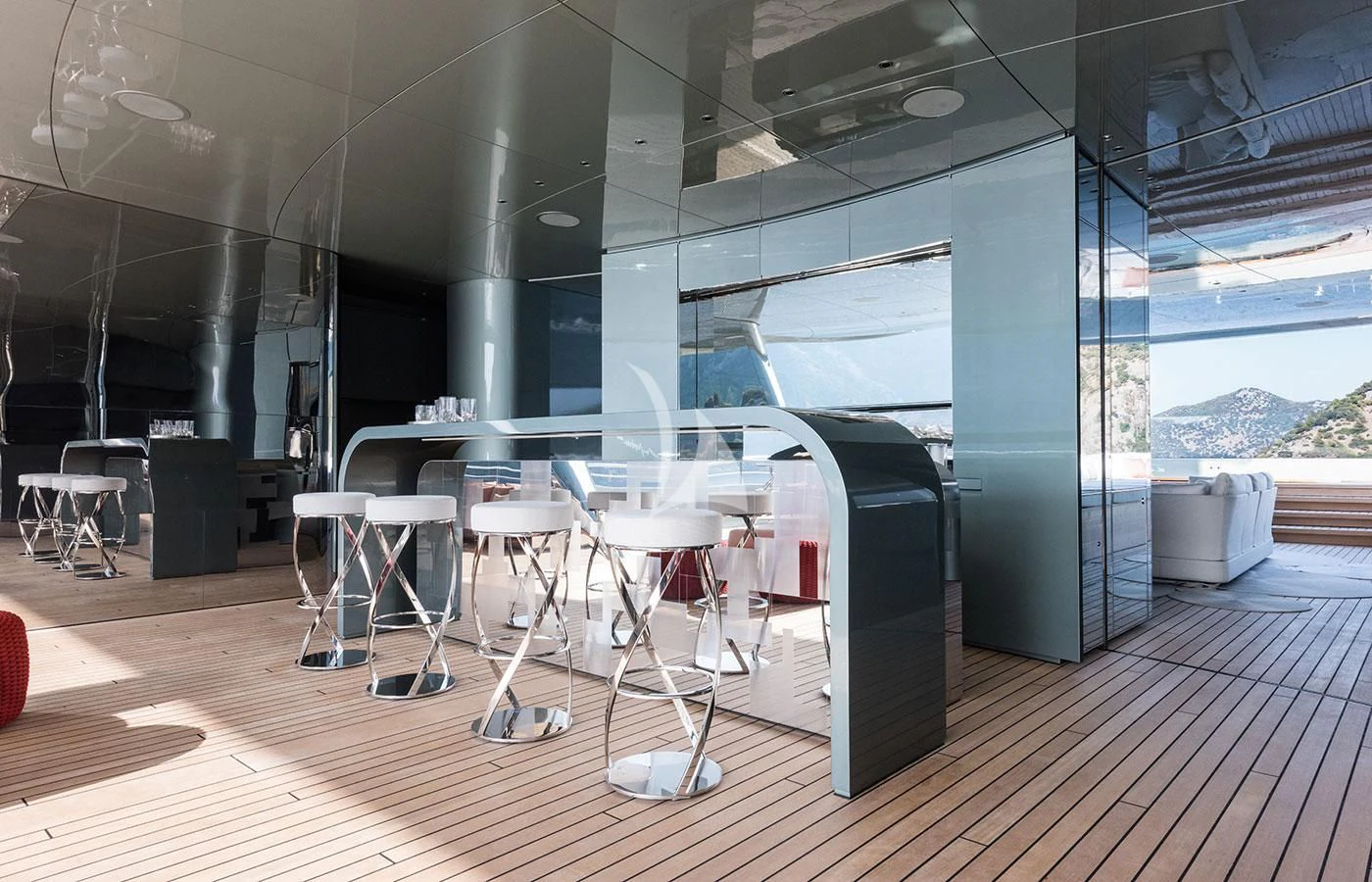 a room with tables and chairs aboard SAVANNAH Yacht for Sale