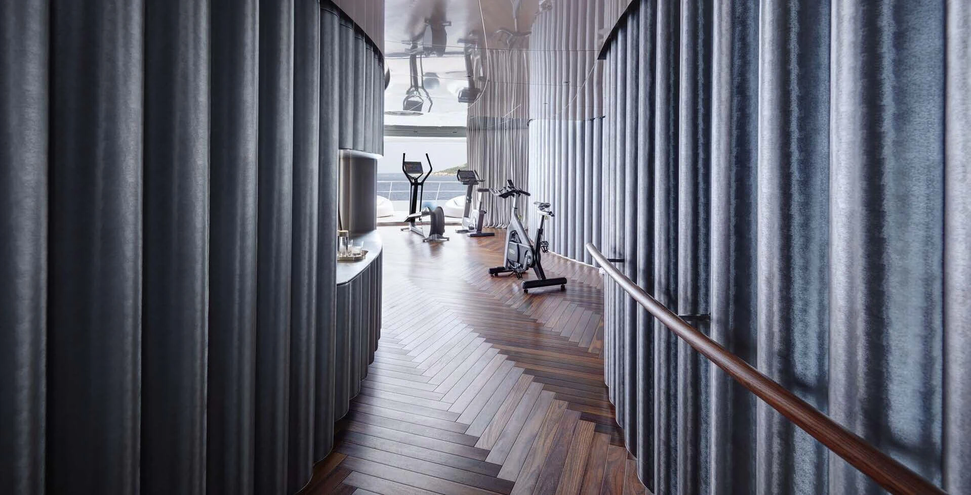 a black and white striped room with a wood railing and a black curtain aboard SAVANNAH Yacht for Sale
