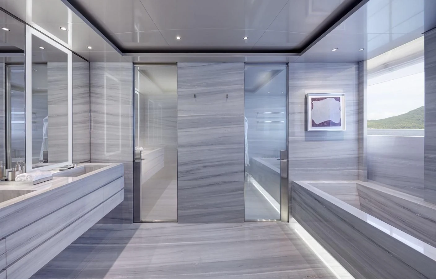 a room with glass walls and a wood floor and a large window aboard SAVANNAH Yacht for Sale