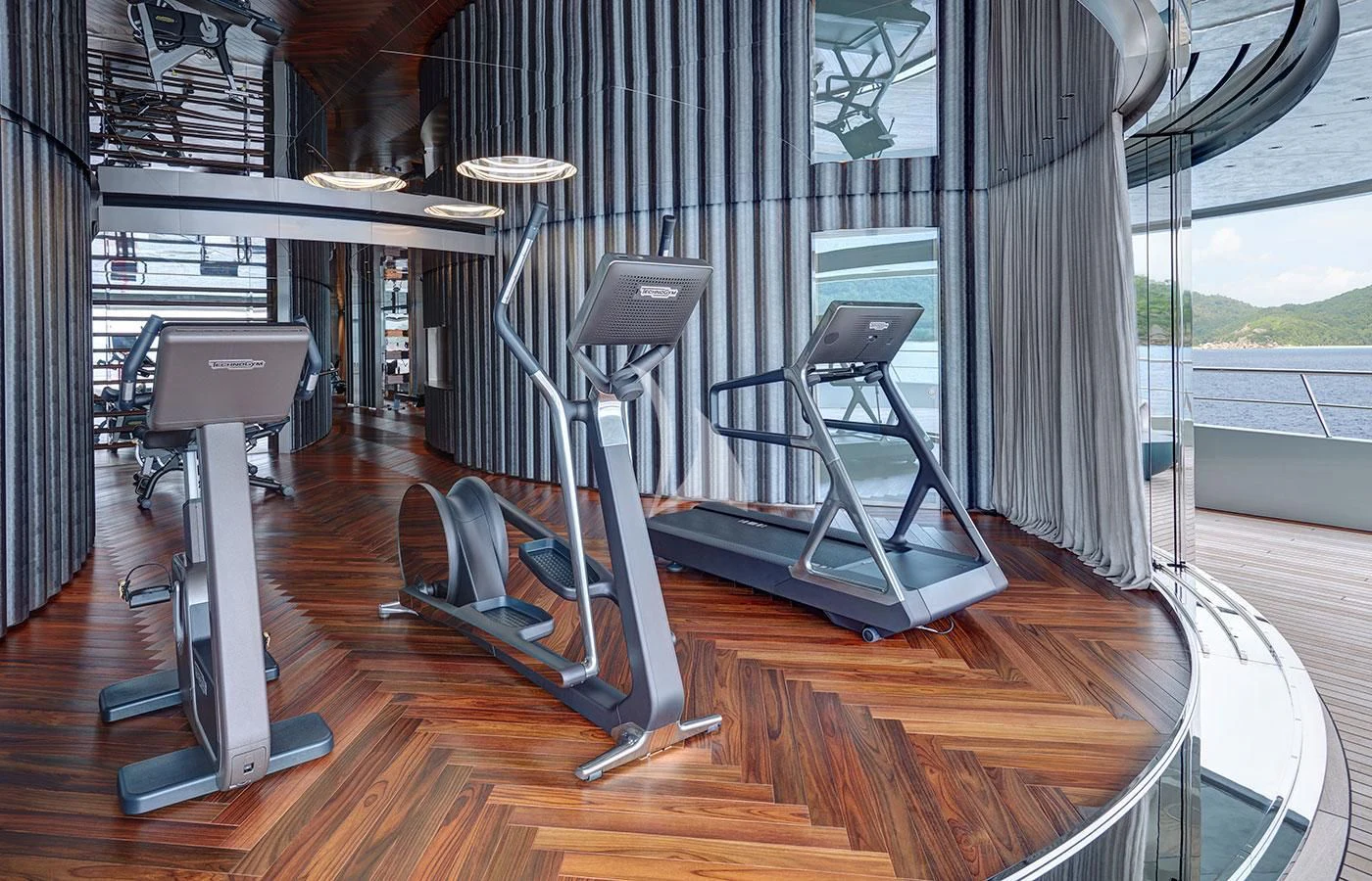 a gym with treadmills aboard SAVANNAH Yacht for Sale