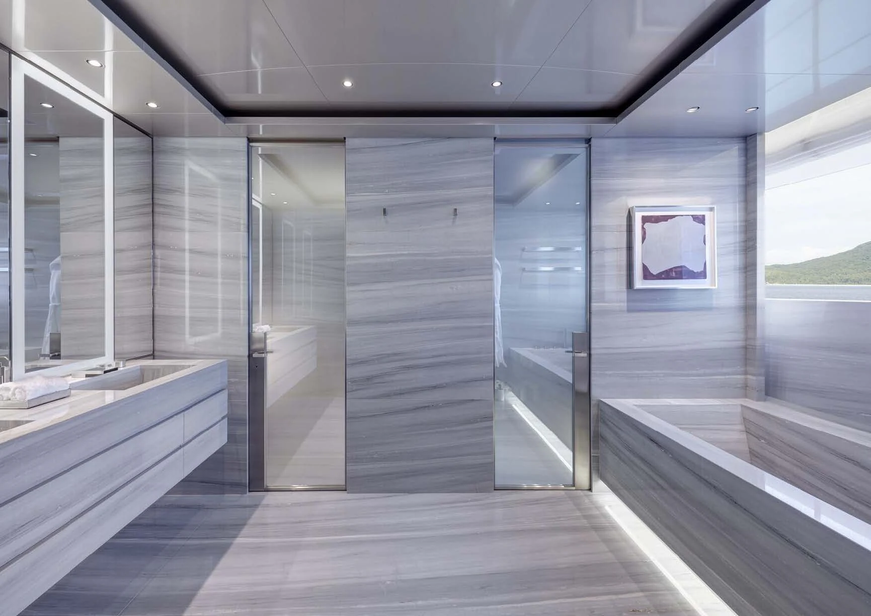 a large glass walled room aboard SAVANNAH Yacht for Sale