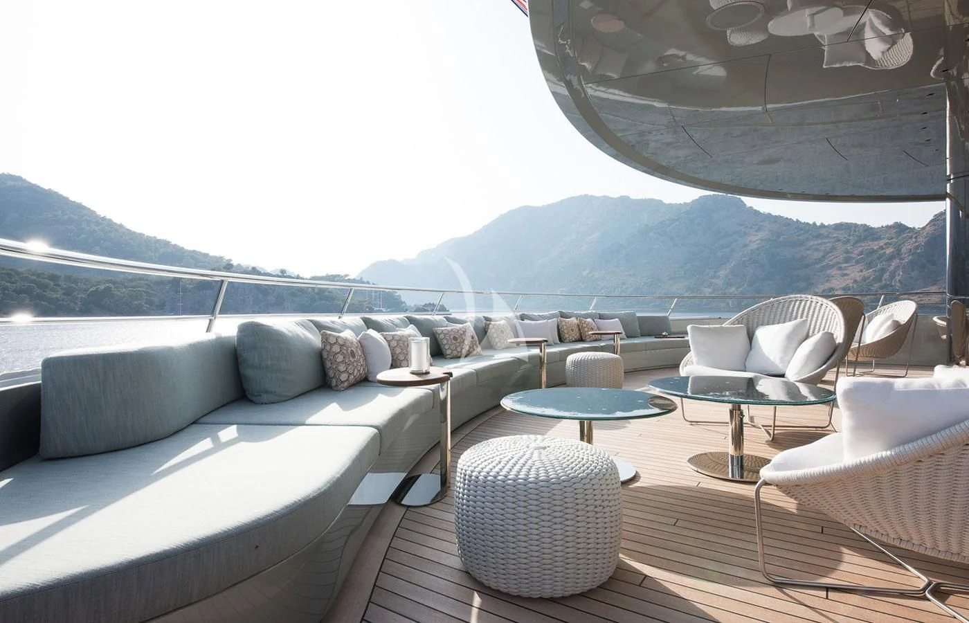 a room with a couch and a table and chairs aboard SAVANNAH Yacht for Sale