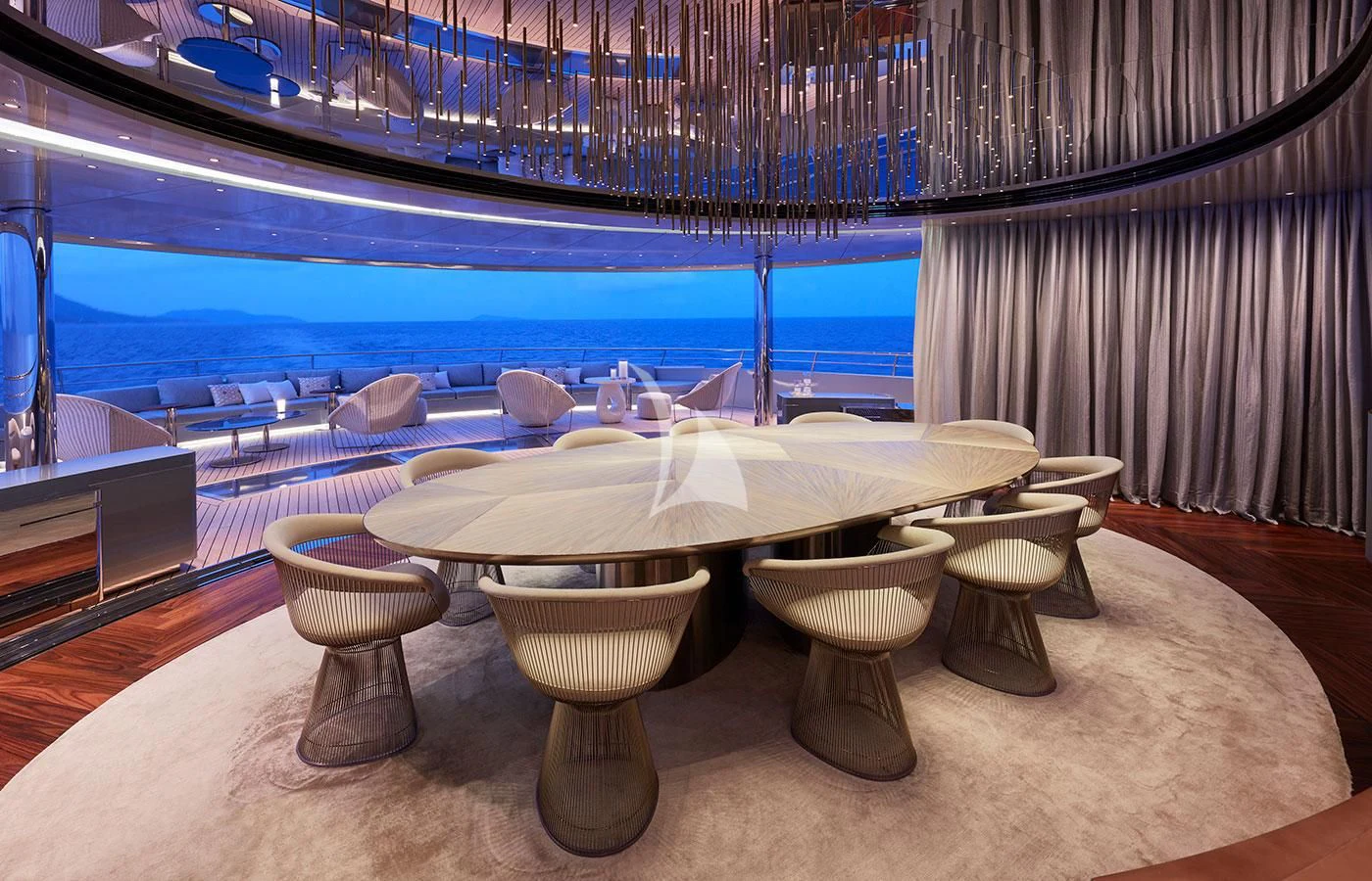 a room with a table and chairs aboard SAVANNAH Yacht for Sale