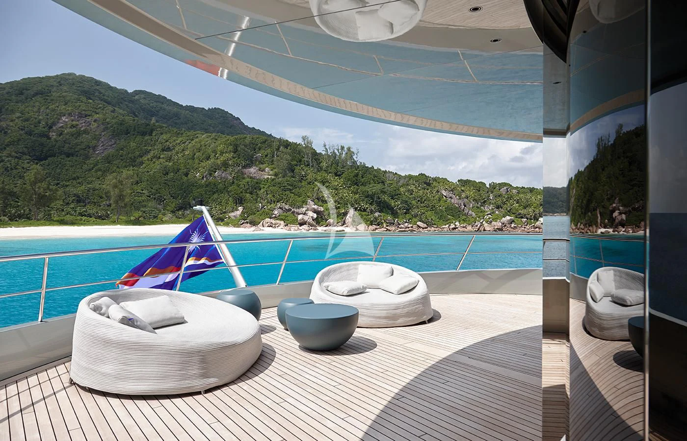 a couple of bowls on a table by a pool aboard SAVANNAH Yacht for Sale