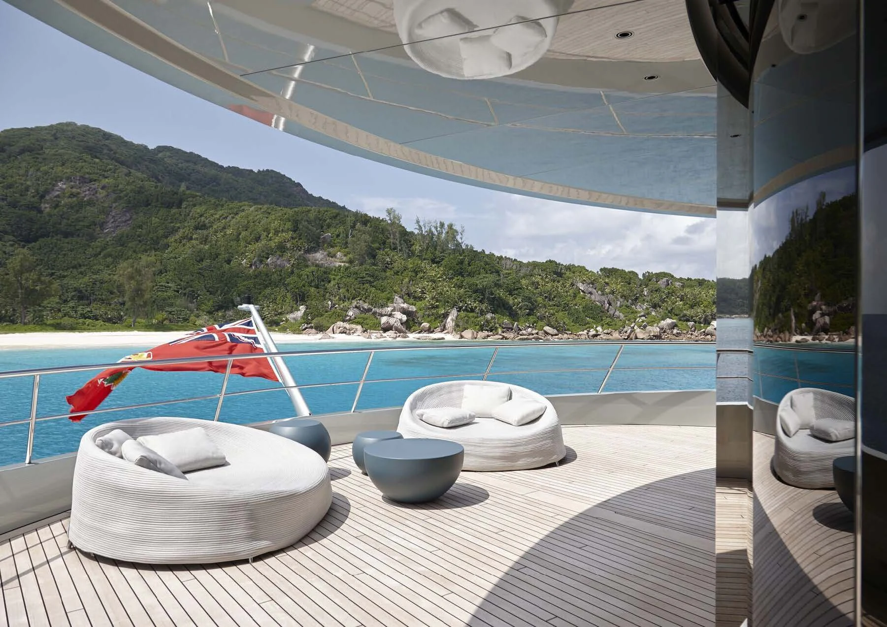 a couple of bowls on a deck overlooking a body of water aboard SAVANNAH Yacht for Sale