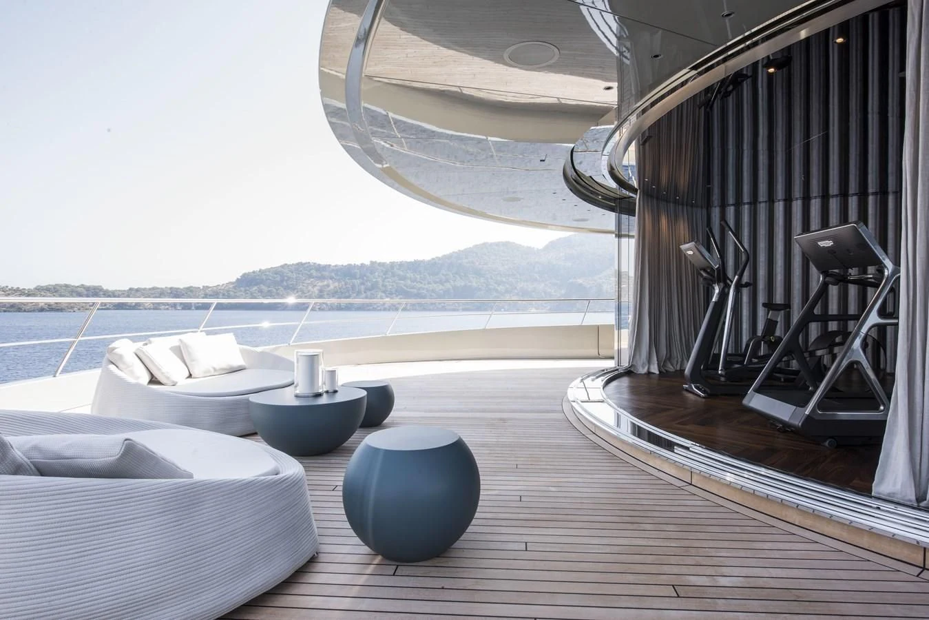 a room with a large window and a view of the ocean aboard SAVANNAH Yacht for Sale