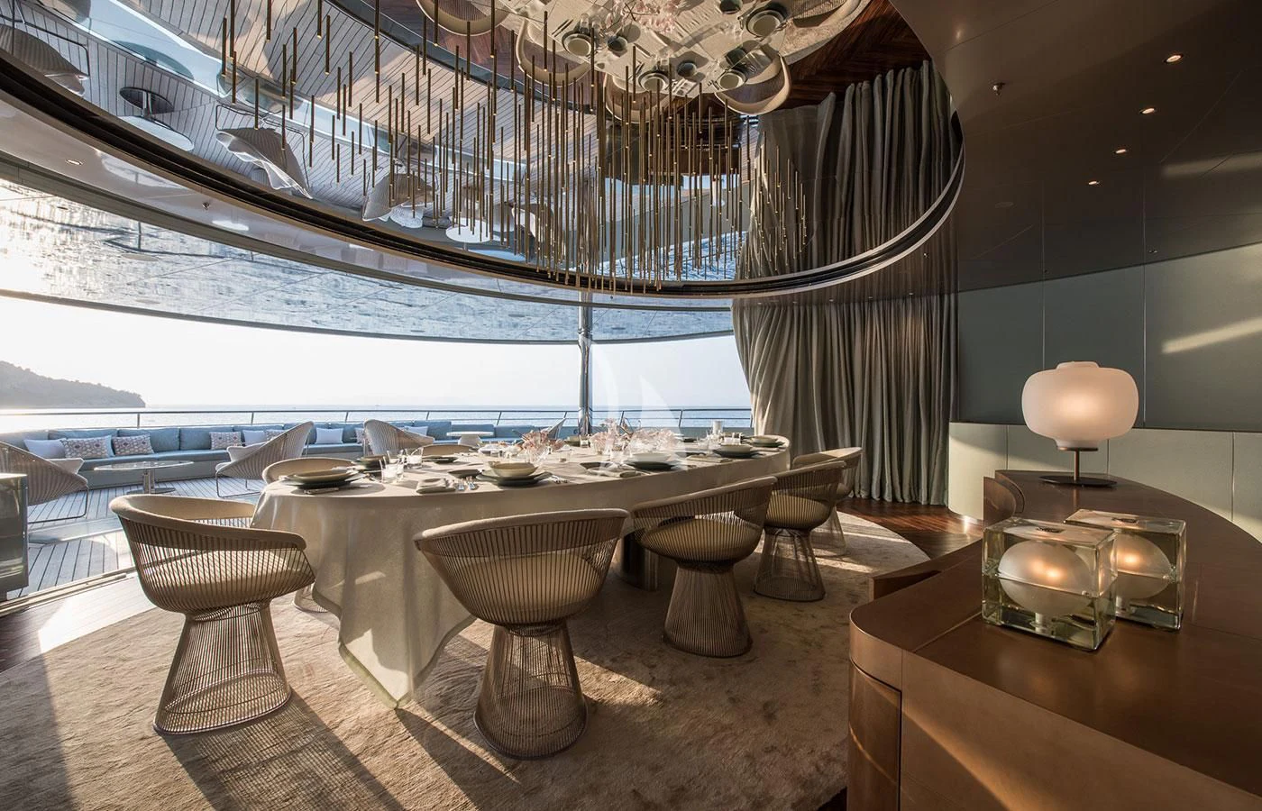 a room with a table and chairs aboard SAVANNAH Yacht for Sale
