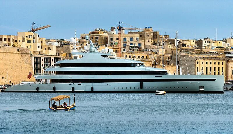 a large ship in the water aboard SAVANNAH Yacht for Sale