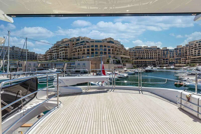 a large building with a dock and boats in it aboard NEW EDGE Yacht for Sale