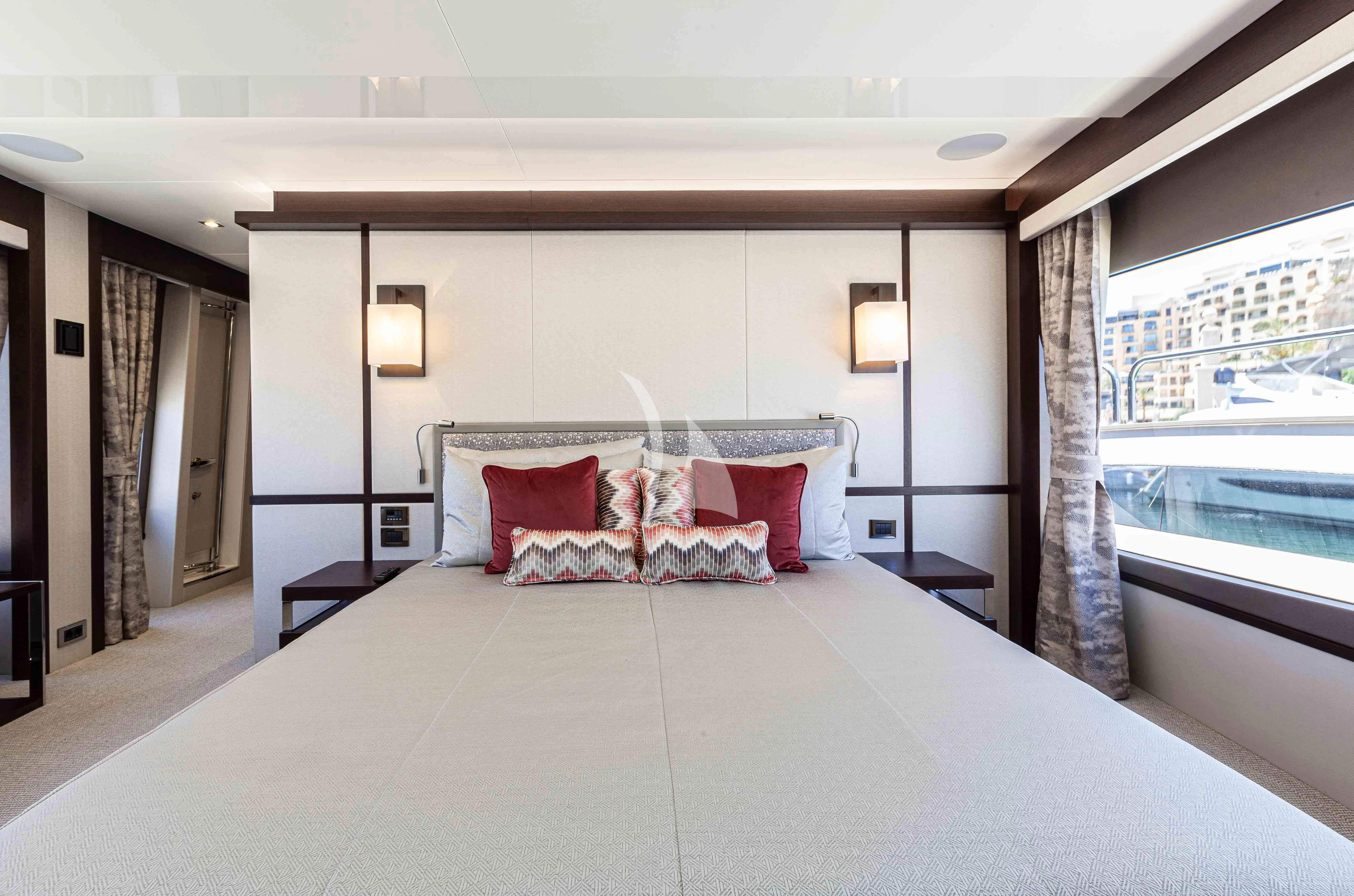 a bed with pillows aboard NEW EDGE Yacht for Sale