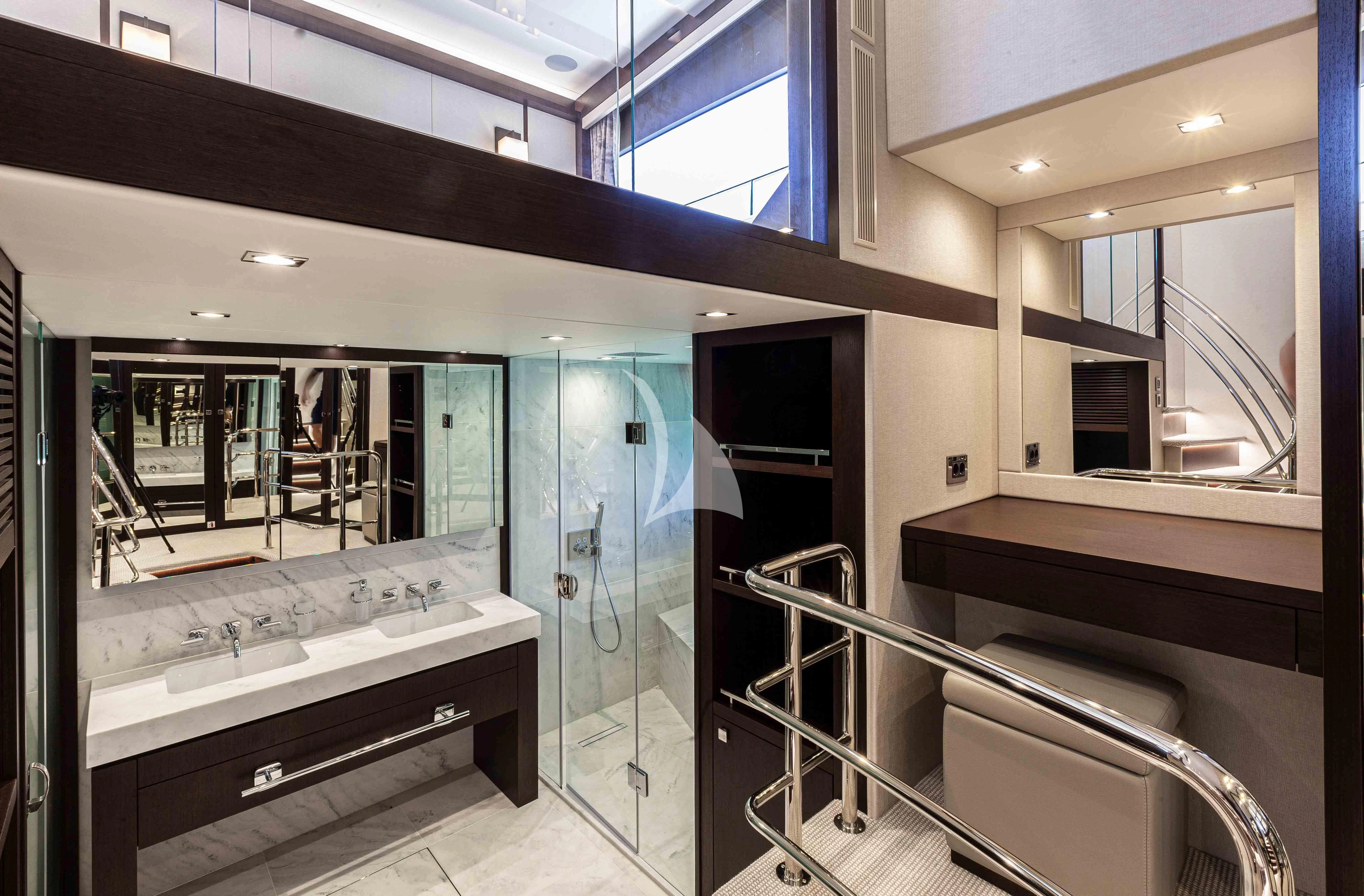 a bathroom with a glass shower aboard NEW EDGE Yacht for Sale