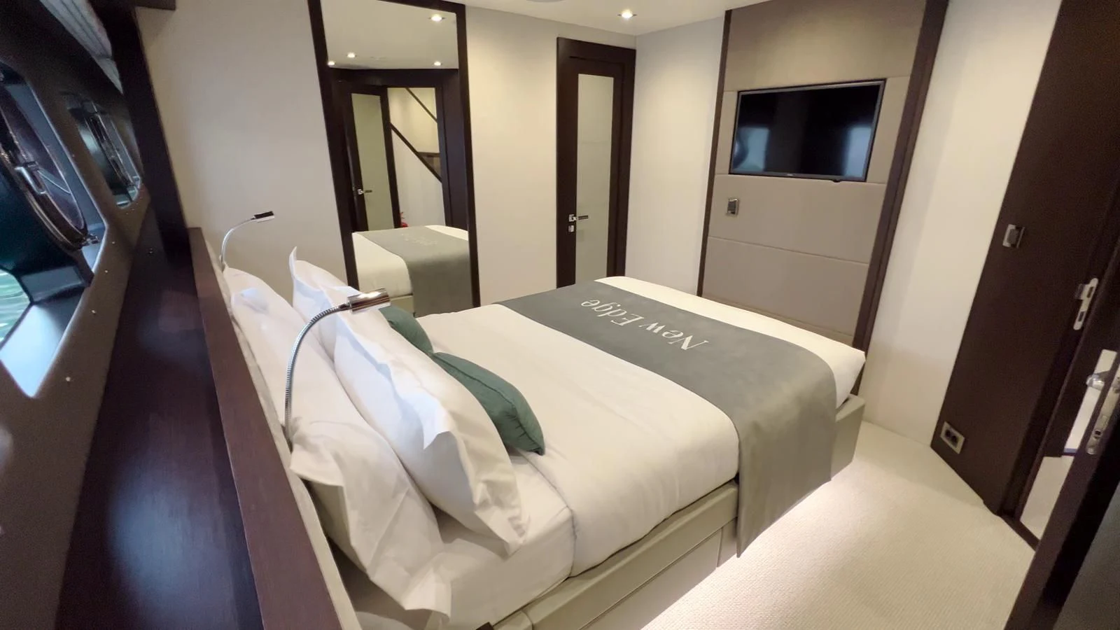 a hotel room with a bed aboard NEW EDGE Yacht for Sale