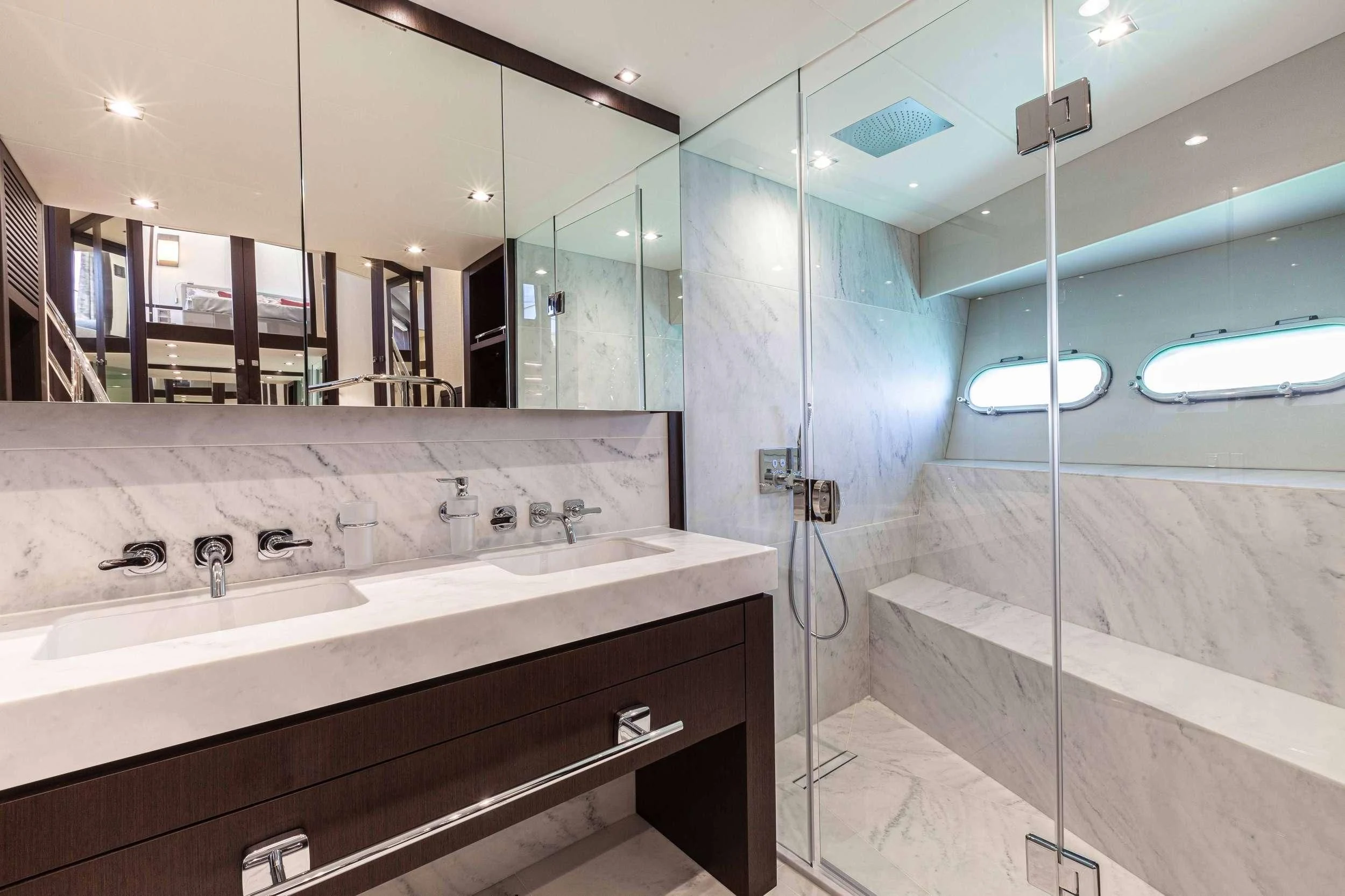 a bathroom with a large mirror aboard NEW EDGE Yacht for Sale