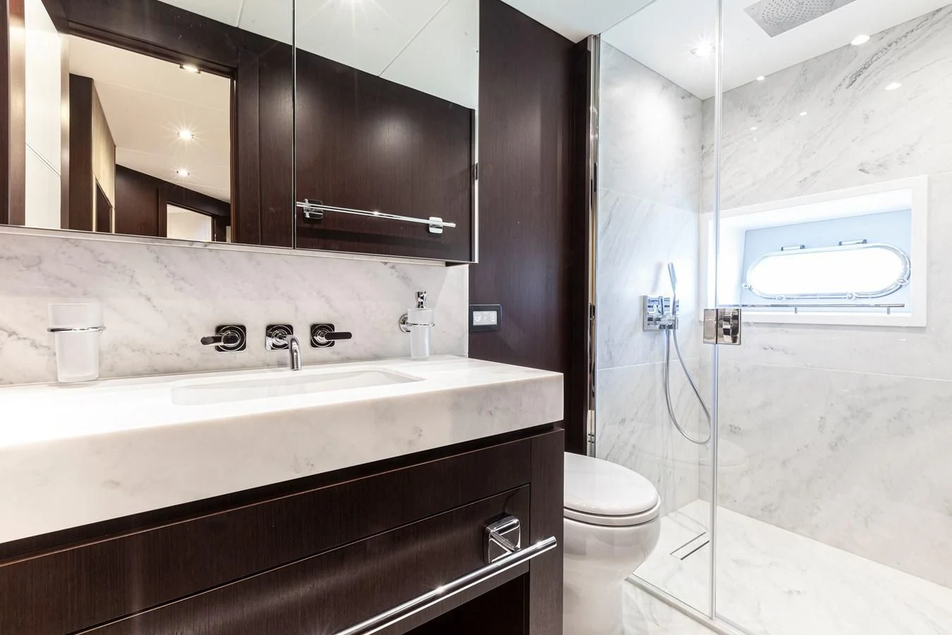 a bathroom with a sink and a toilet aboard NEW EDGE Yacht for Sale