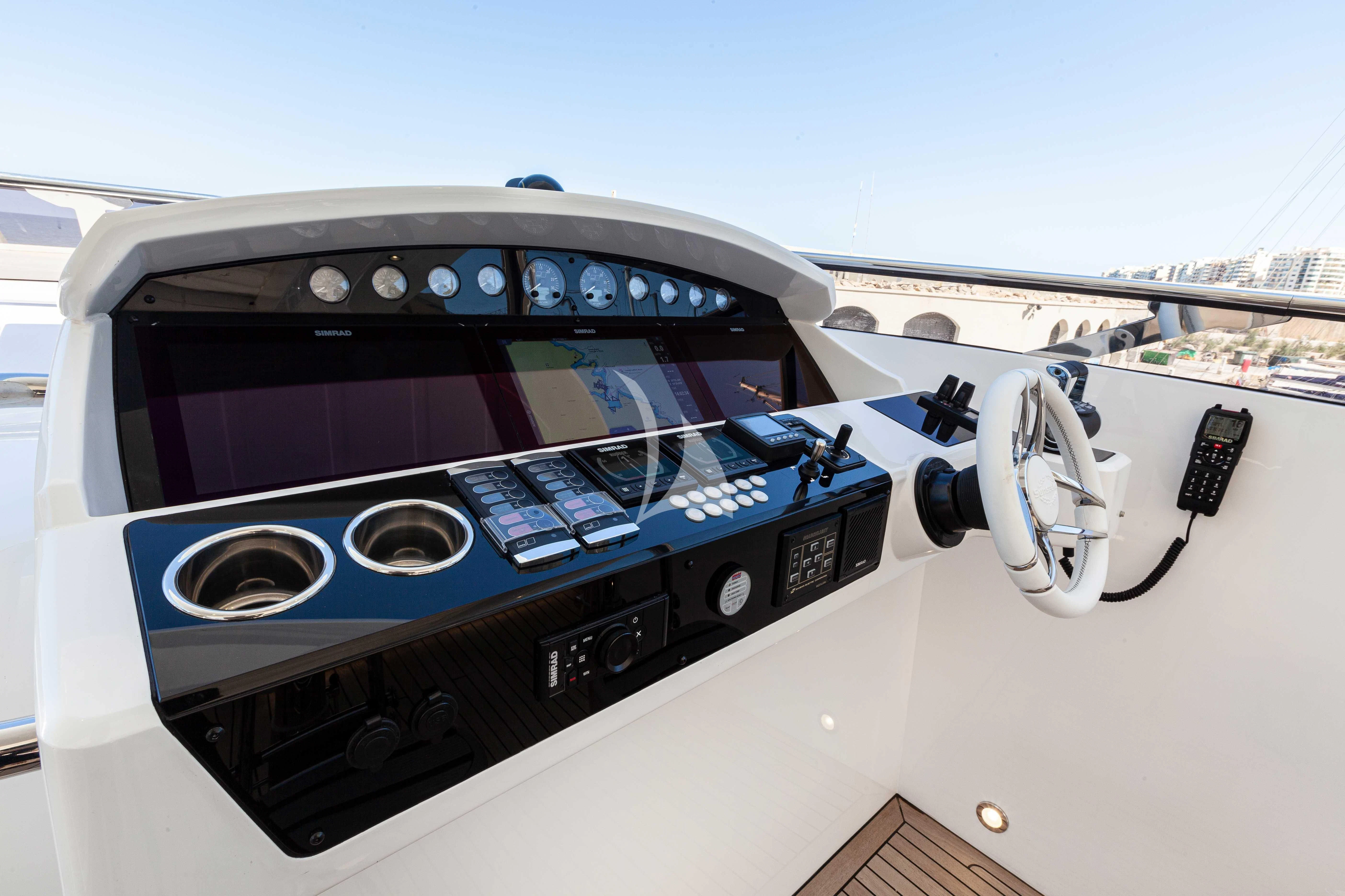 a white and blue car aboard NEW EDGE Yacht for Sale