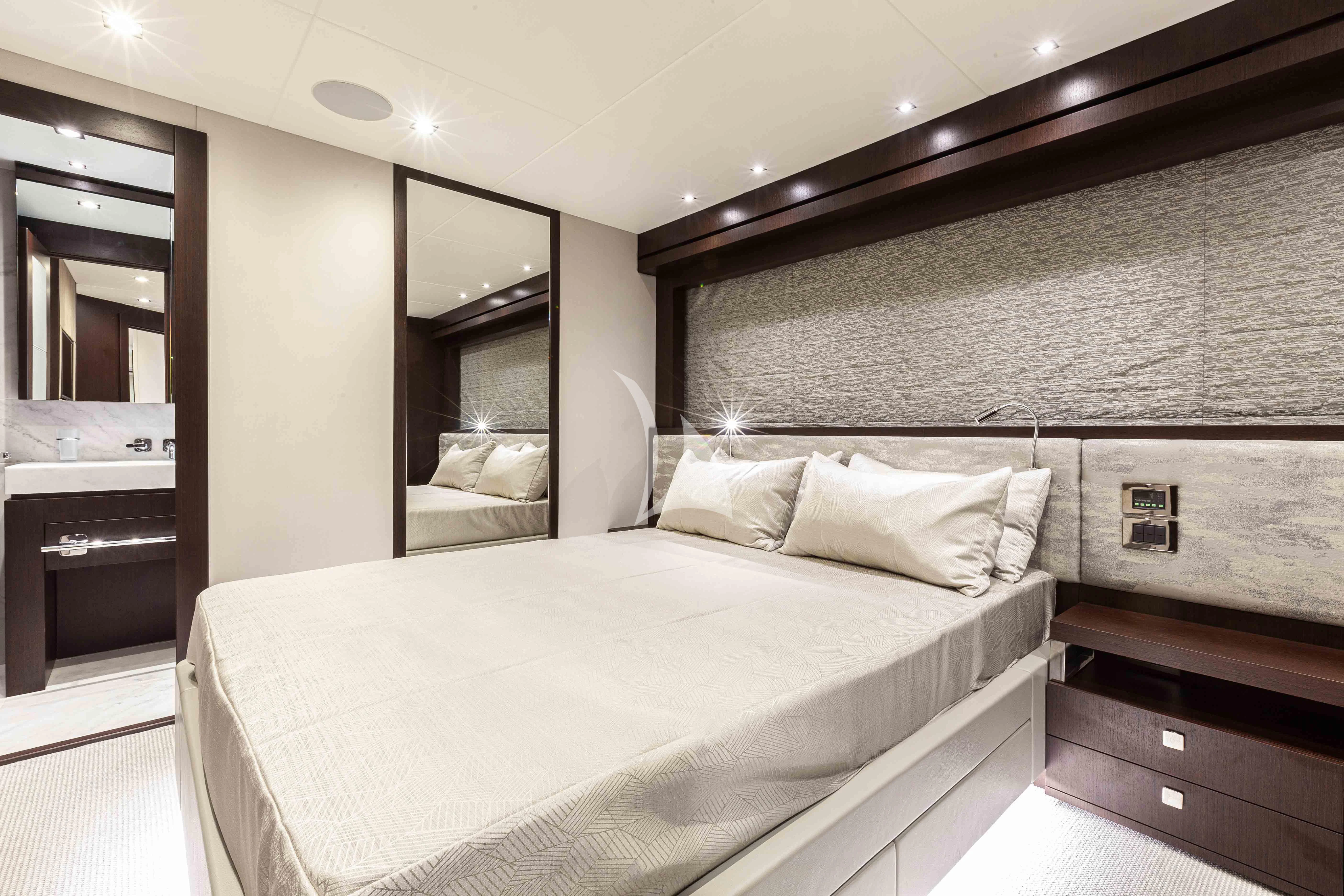 a bedroom with a bed aboard NEW EDGE Yacht for Sale