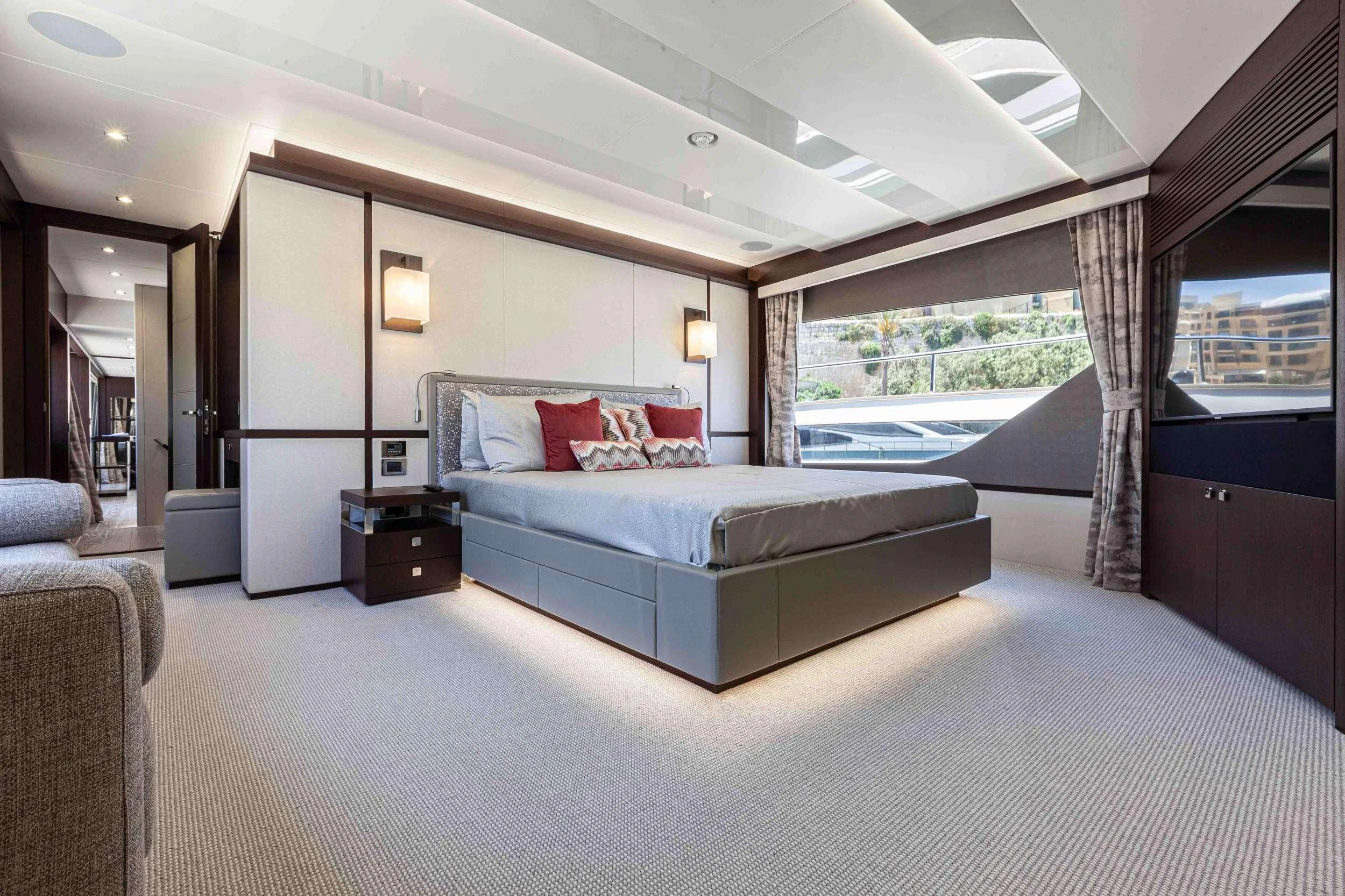 a large bedroom with a large bed aboard NEW EDGE Yacht for Sale