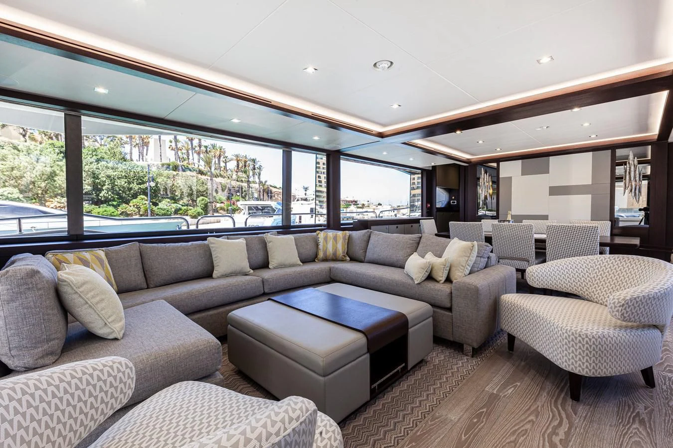 a living room with a large window aboard NEW EDGE Yacht for Sale