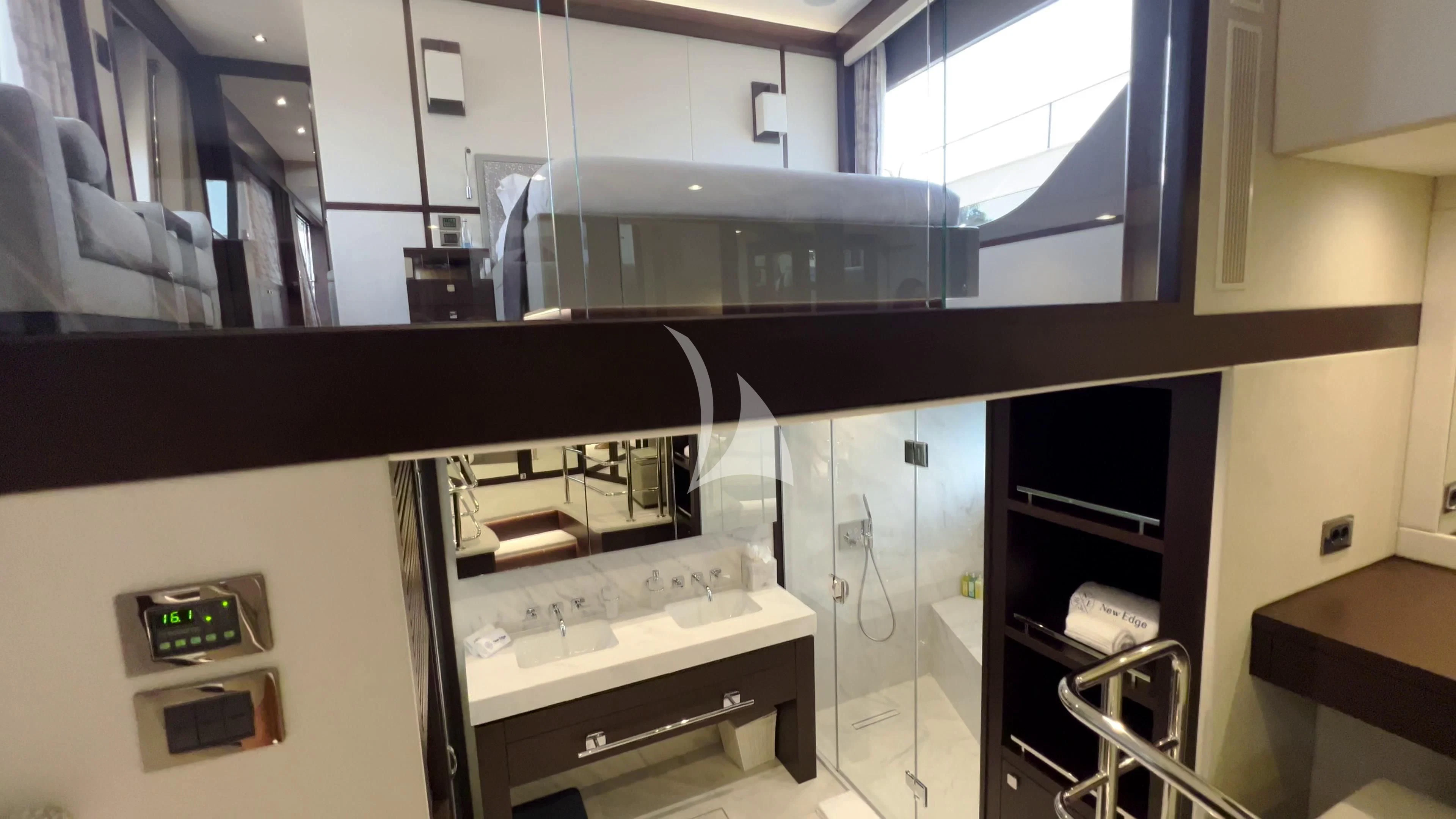 a kitchen with a stove and cabinets aboard NEW EDGE Yacht for Sale