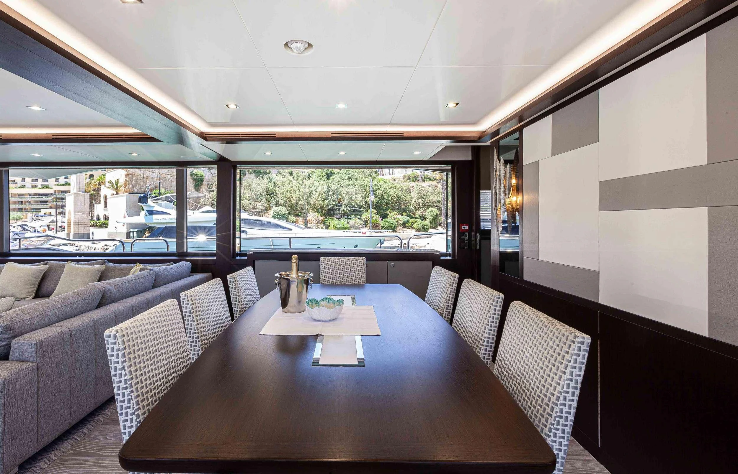 a table and chairs in a room aboard NEW EDGE Yacht for Sale