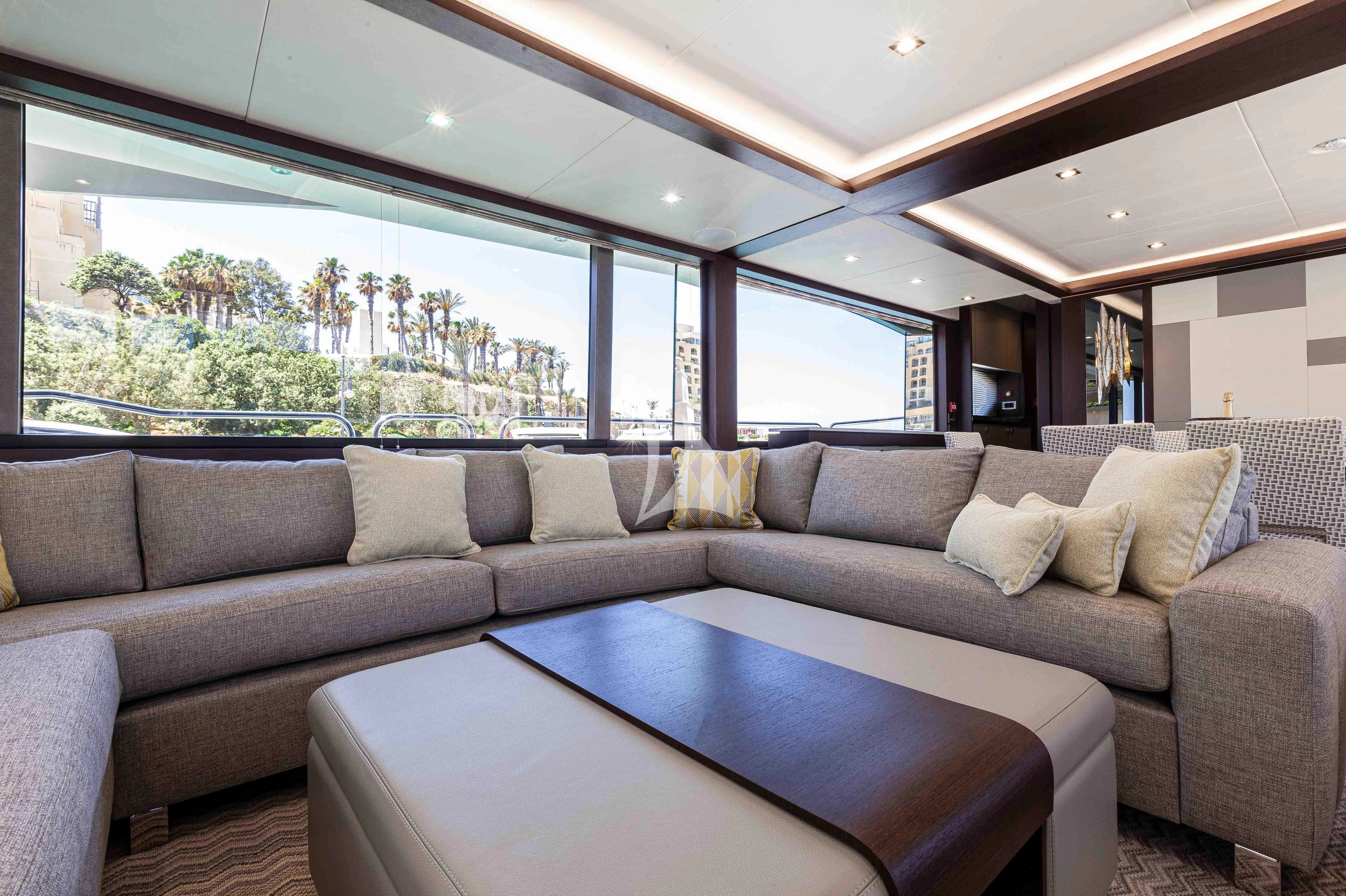 a couch in a car aboard NEW EDGE Yacht for Sale
