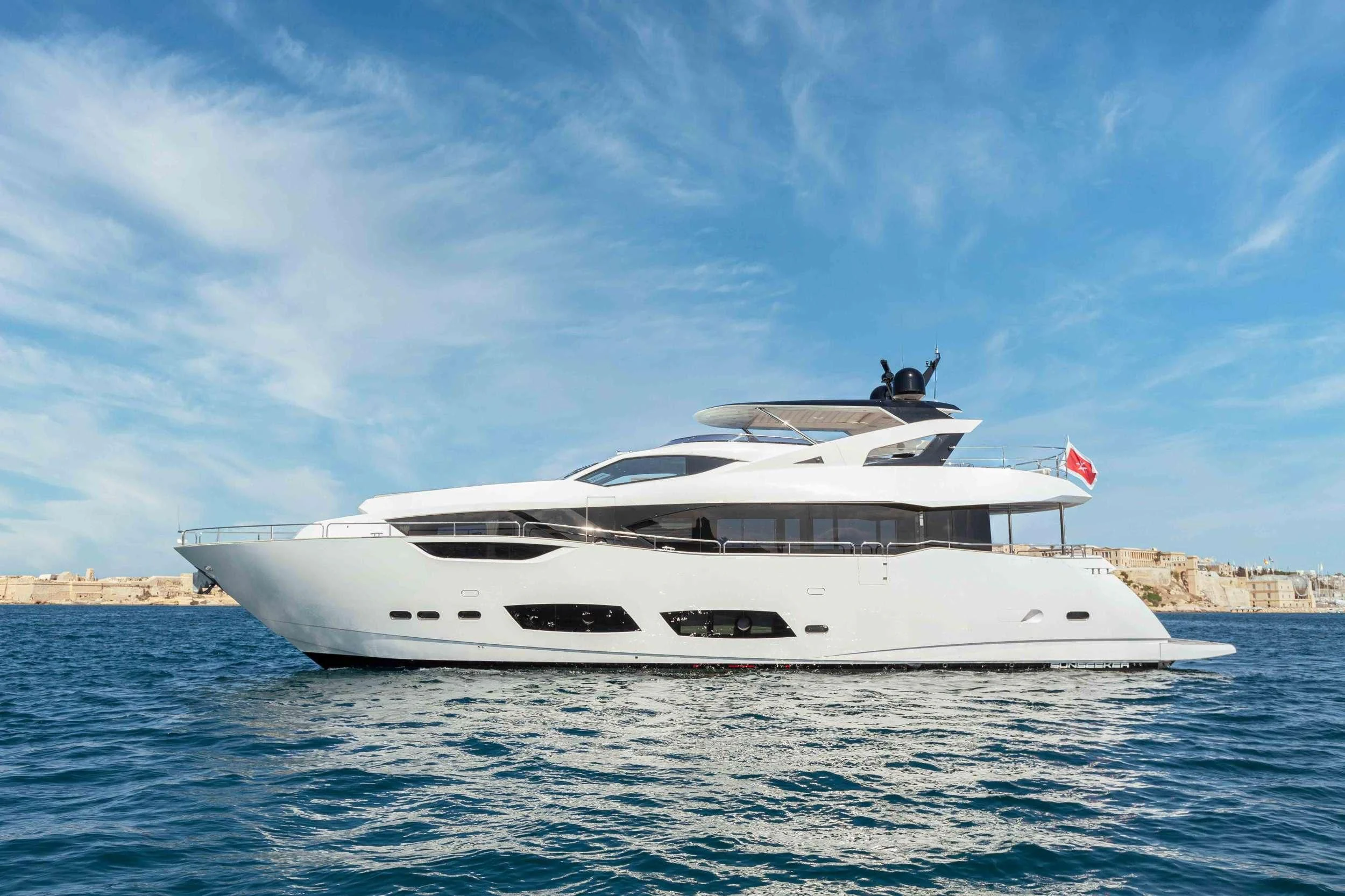 a white yacht in the water aboard NEW EDGE Yacht for Sale