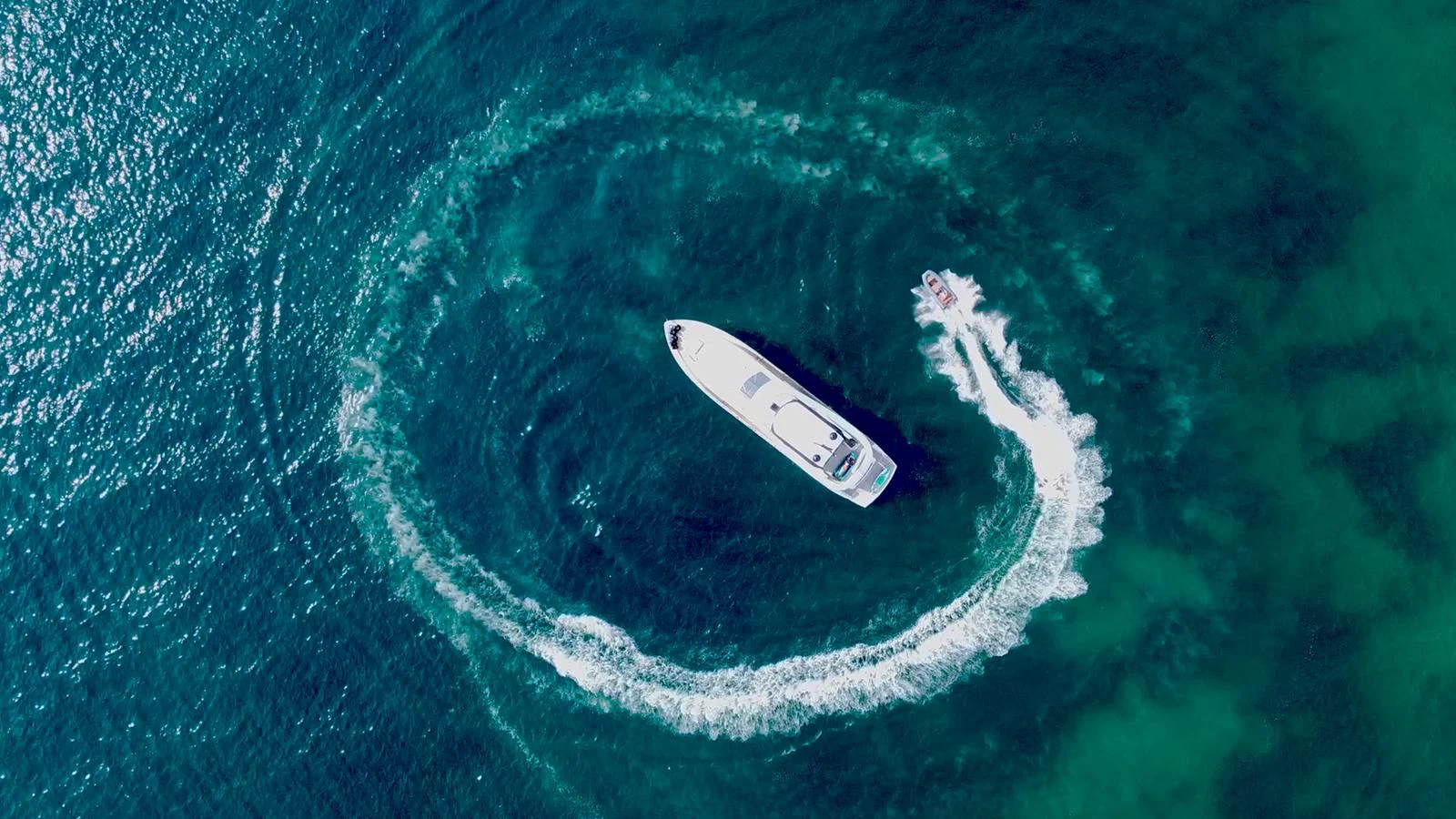 a white boat in the water aboard NEW EDGE Yacht for Sale