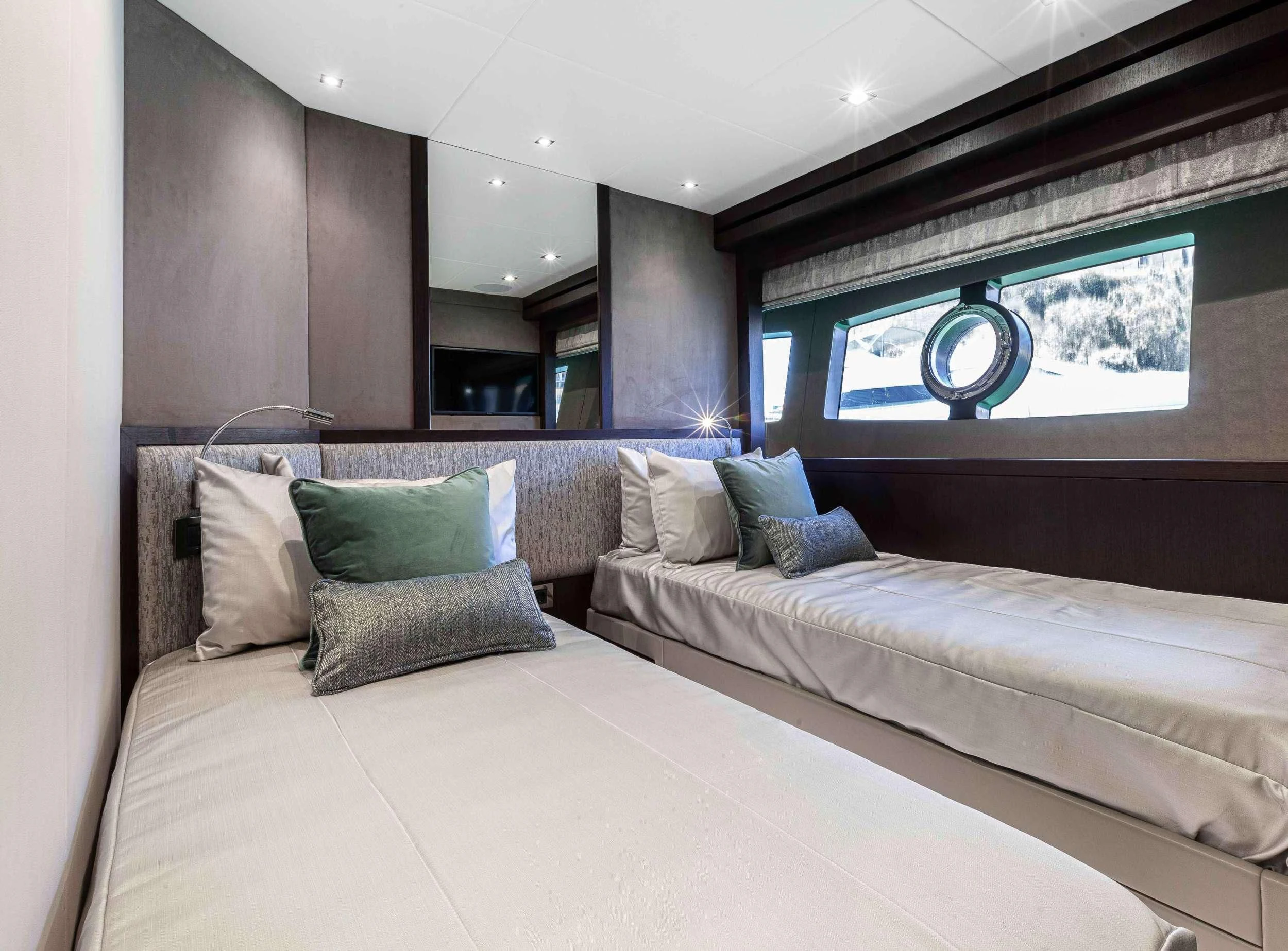 a bed with pillows aboard NEW EDGE Yacht for Sale