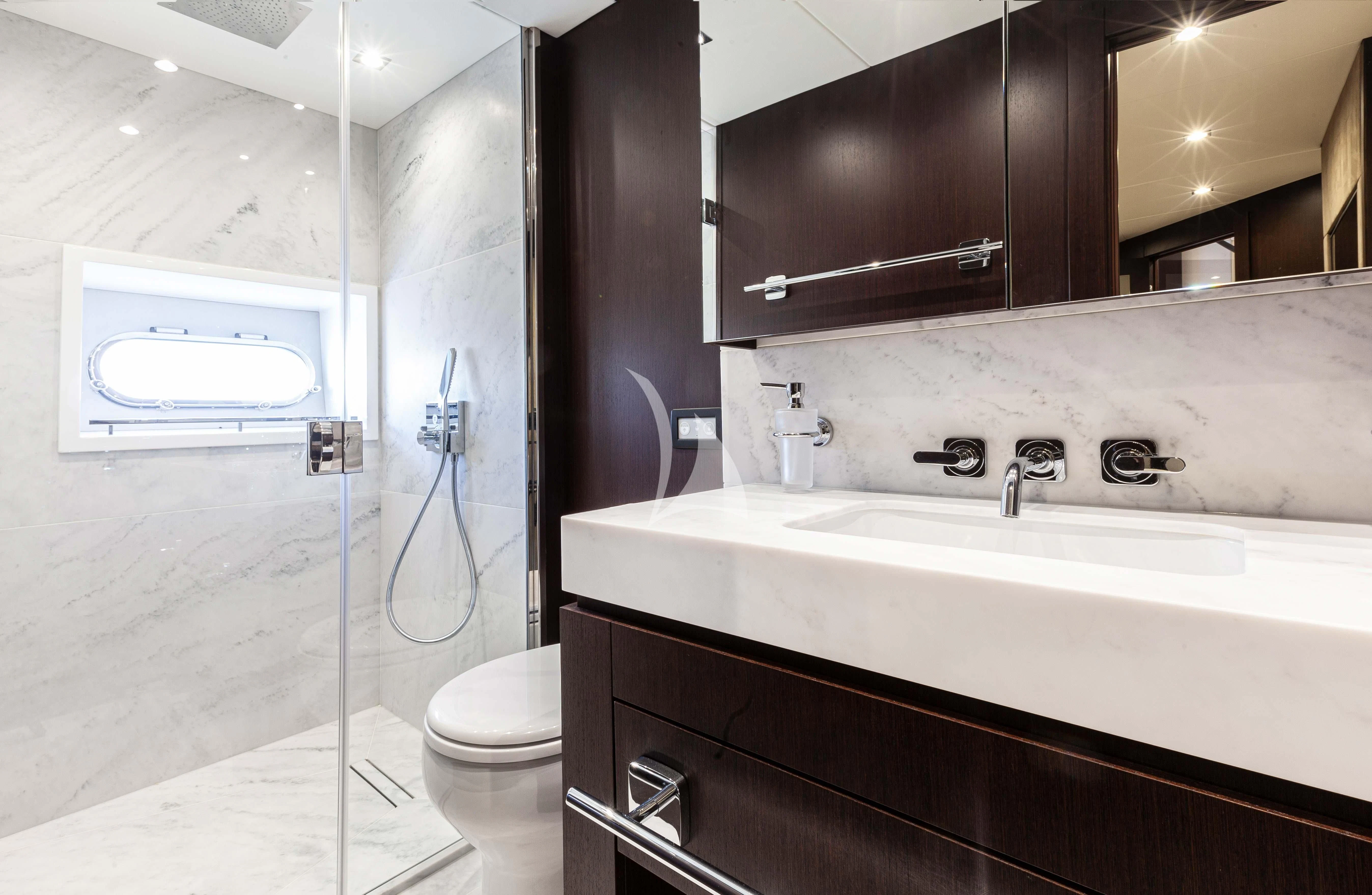 a bathroom with a sink and toilet aboard NEW EDGE Yacht for Sale