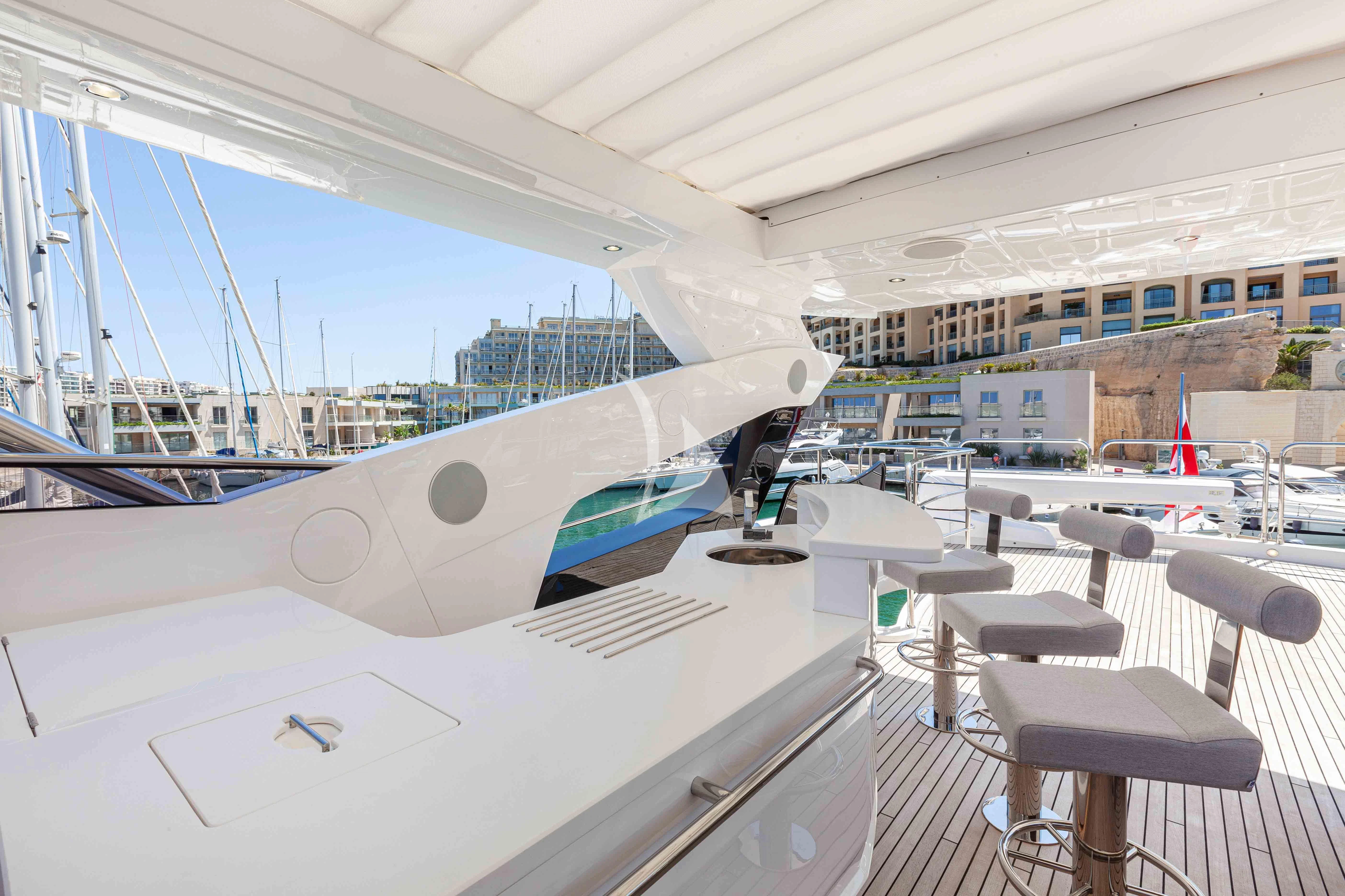 a large white airplane in a hangar aboard NEW EDGE Yacht for Sale