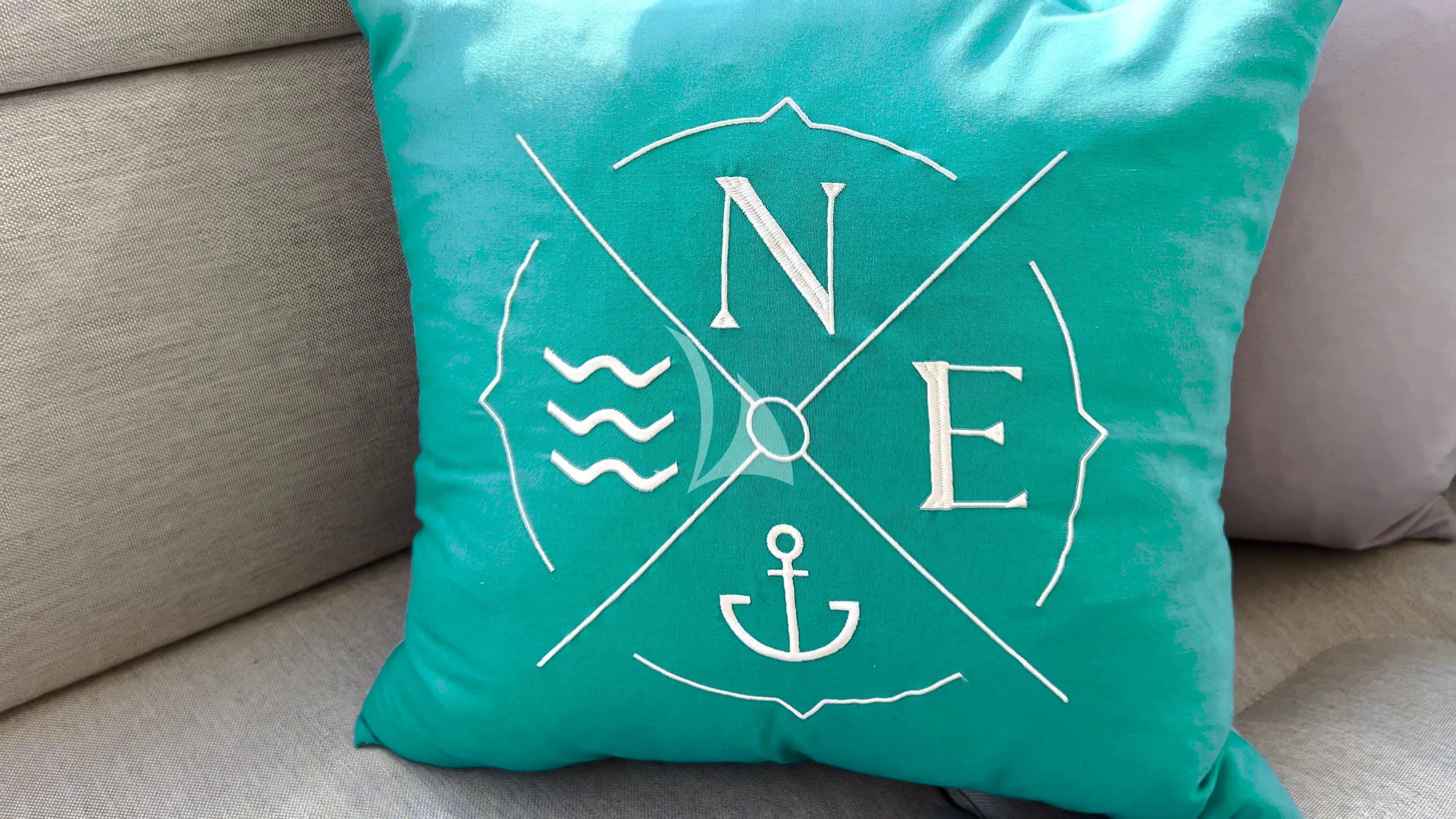 a green pillow with white text aboard NEW EDGE Yacht for Sale