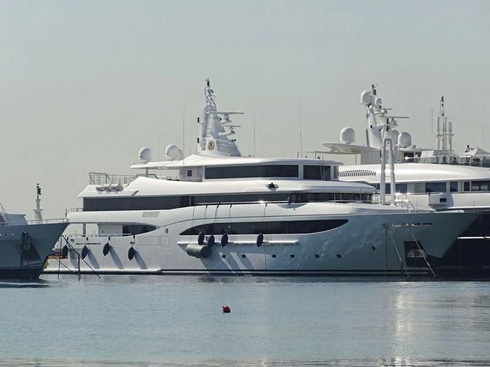 a large white yacht aboard TACANUYASO M S Yacht for Sale
