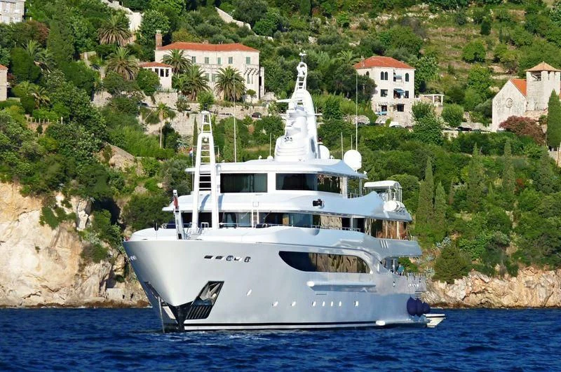 a white boat on the water aboard TACANUYASO M S Yacht for Sale