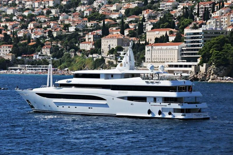 a white yacht in the water aboard TACANUYASO M S Yacht for Sale