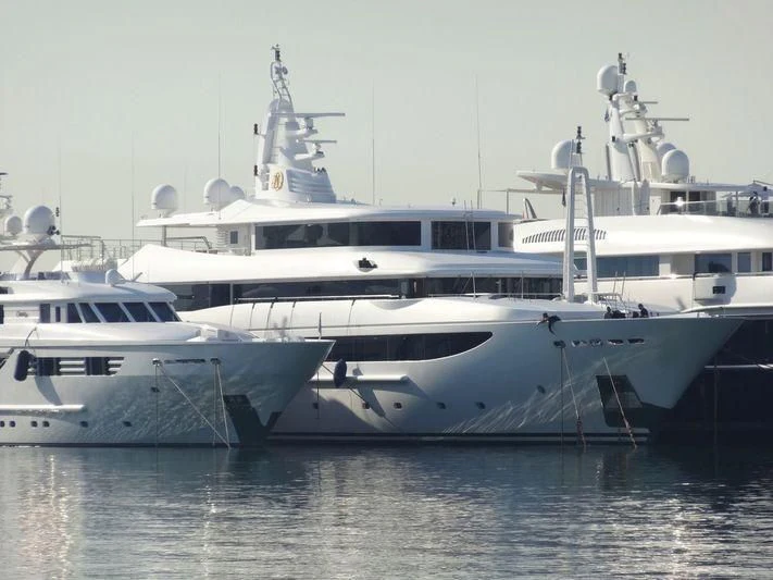 a couple of white yachts aboard TACANUYASO M S Yacht for Sale