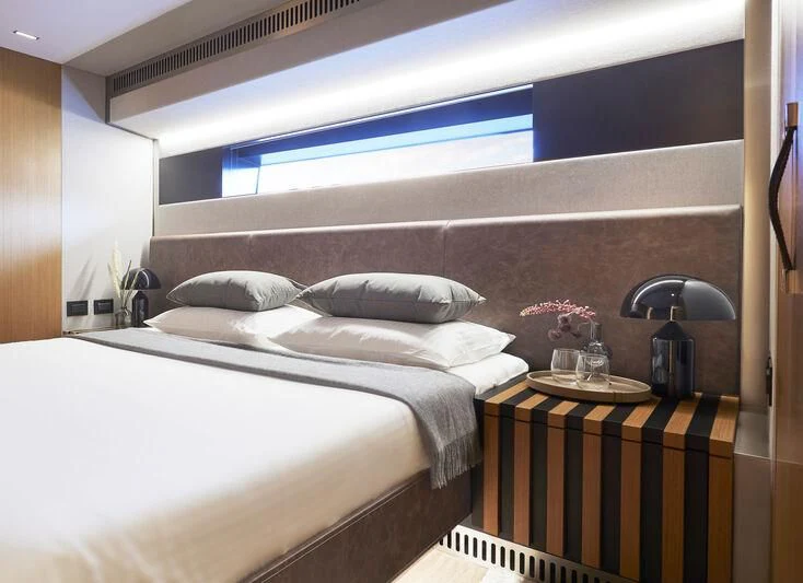 a couple of beds in a room aboard BLUE JEANS Yacht for Sale