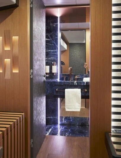 a bathroom with a sink and a mirror aboard BLUE JEANS Yacht for Sale